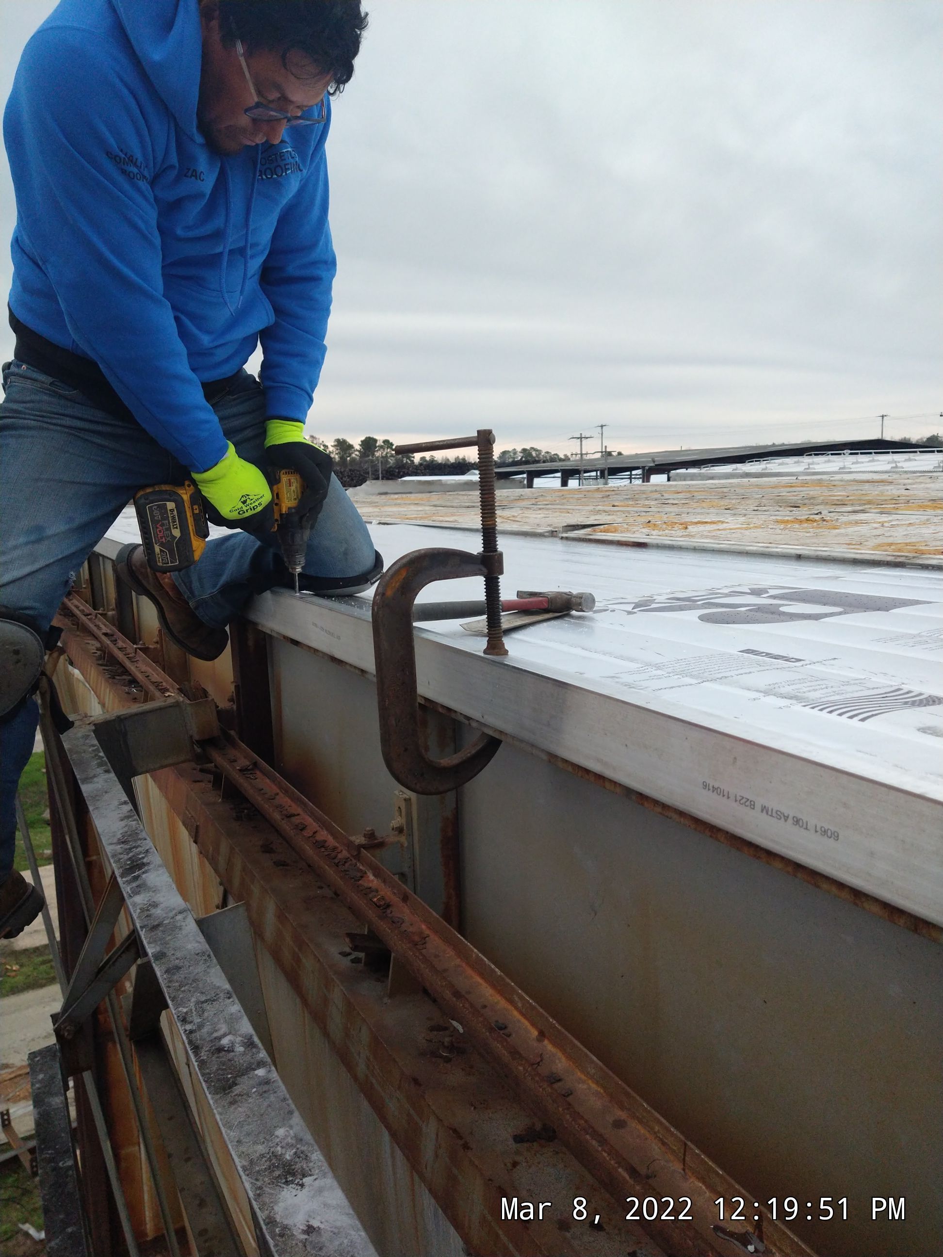 Commercial Roofing Installation using Aluminum Roofing panels by Hostetler Roofing