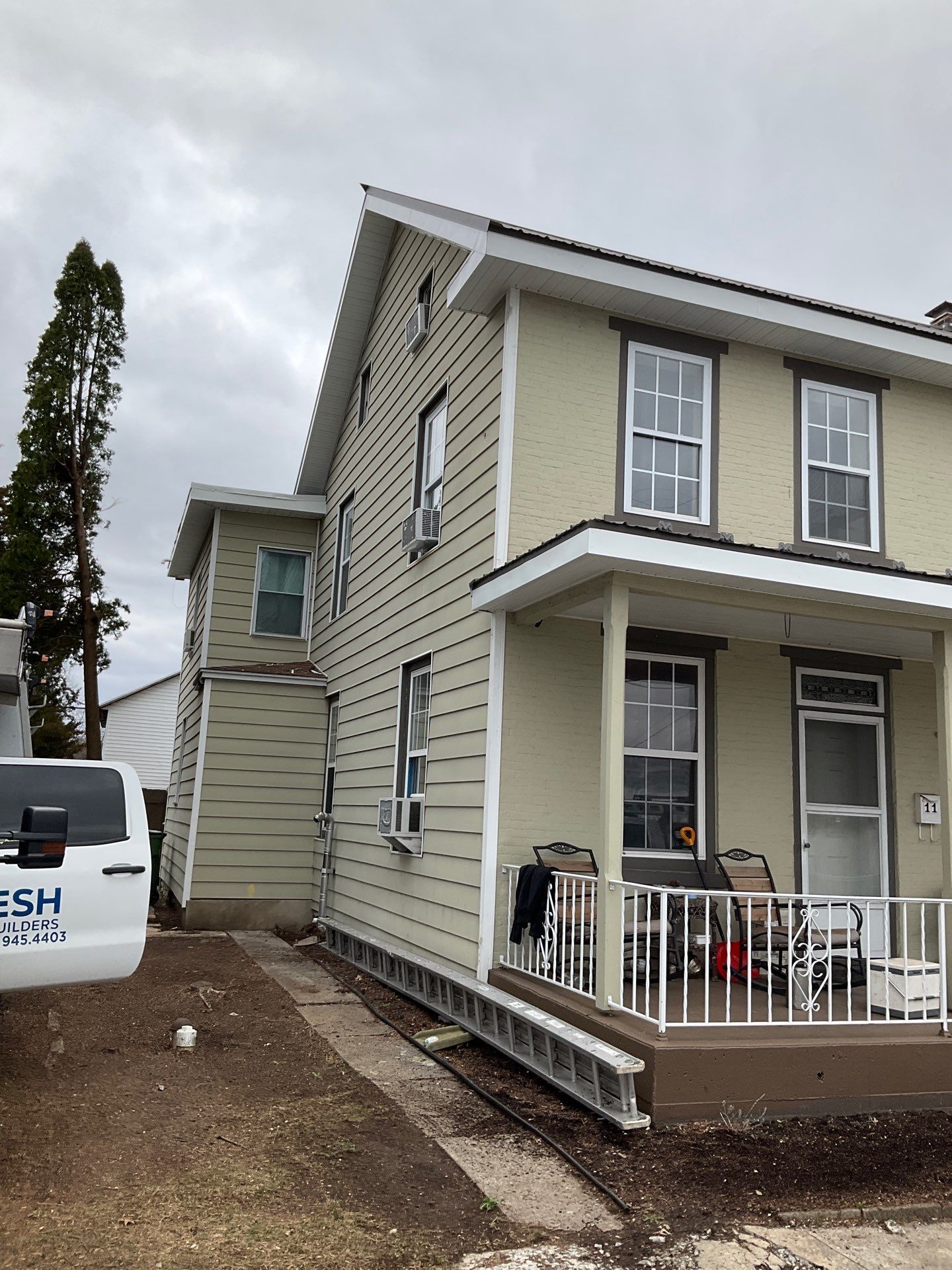 Textured Bronze Roof and Flat Membrane Installation in Hershey by Esh Builders