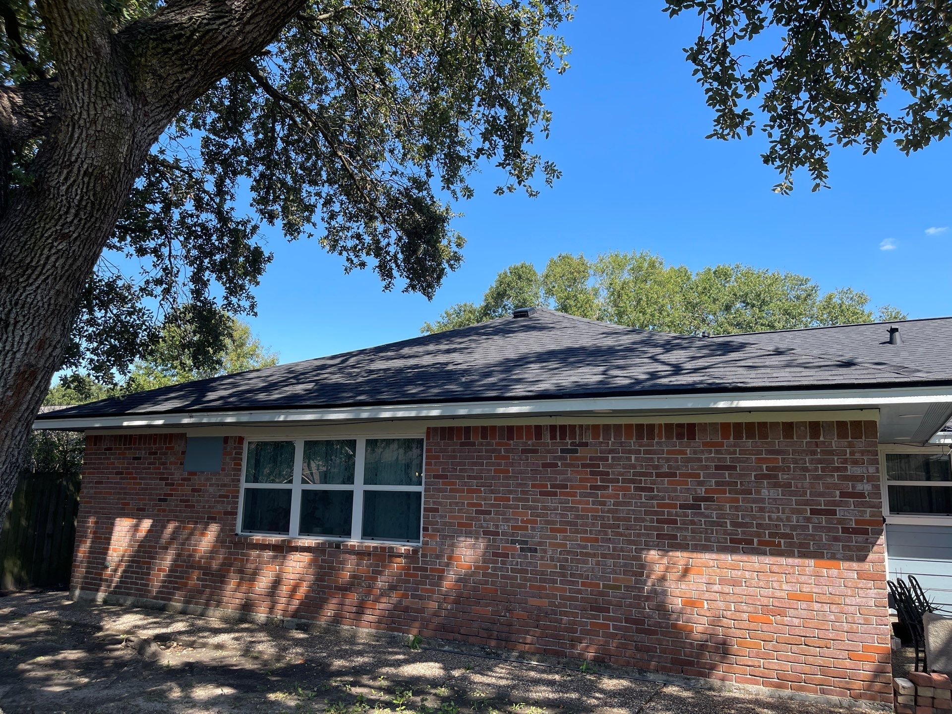 Residential Roofing Installation using Tamko Heritage® Series Rustic Black by CAP Roofing and Construction LLC