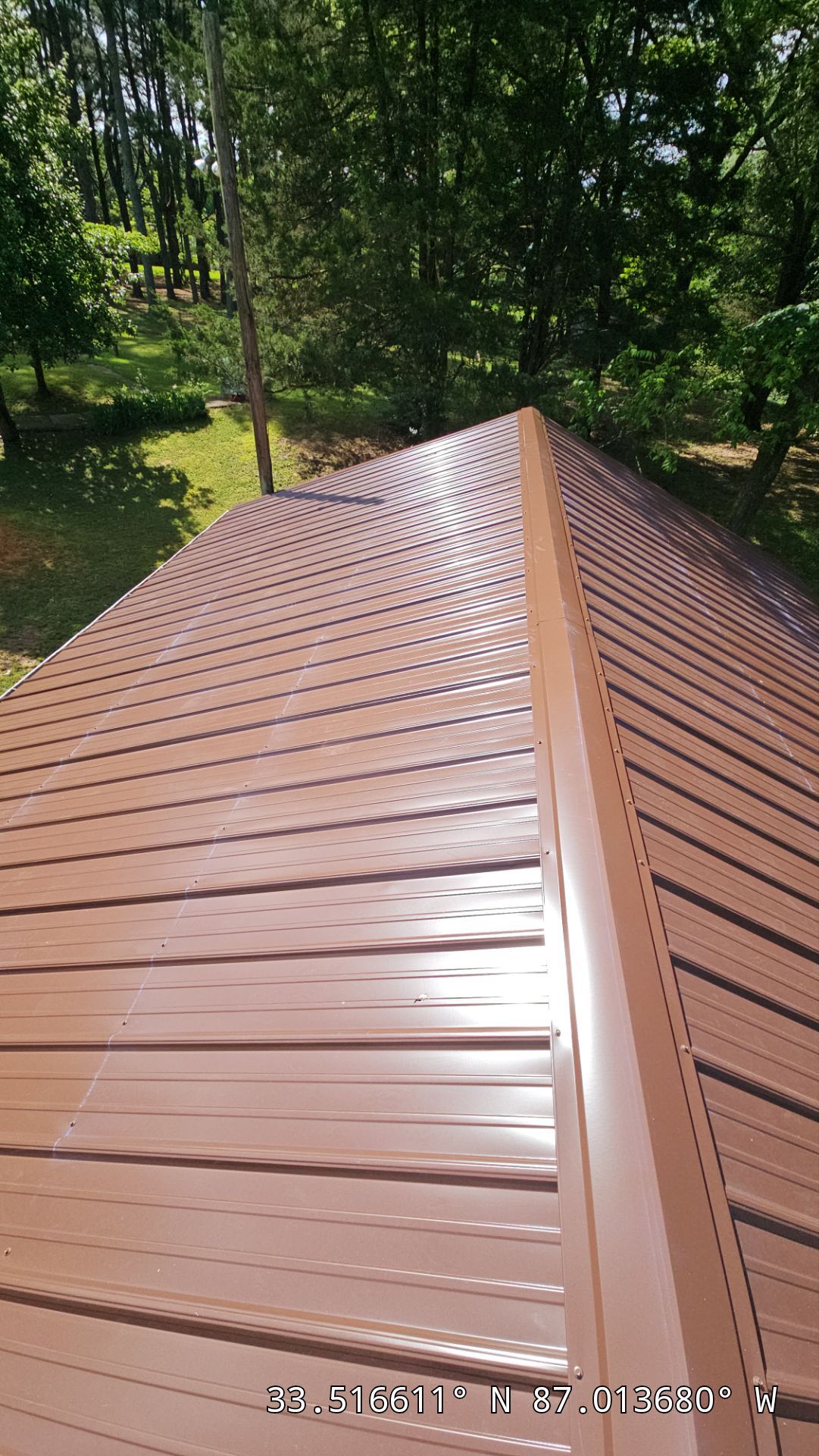 Metal Roof Replacement in Sylvan Springs (Brown) by The Roofing Dudes