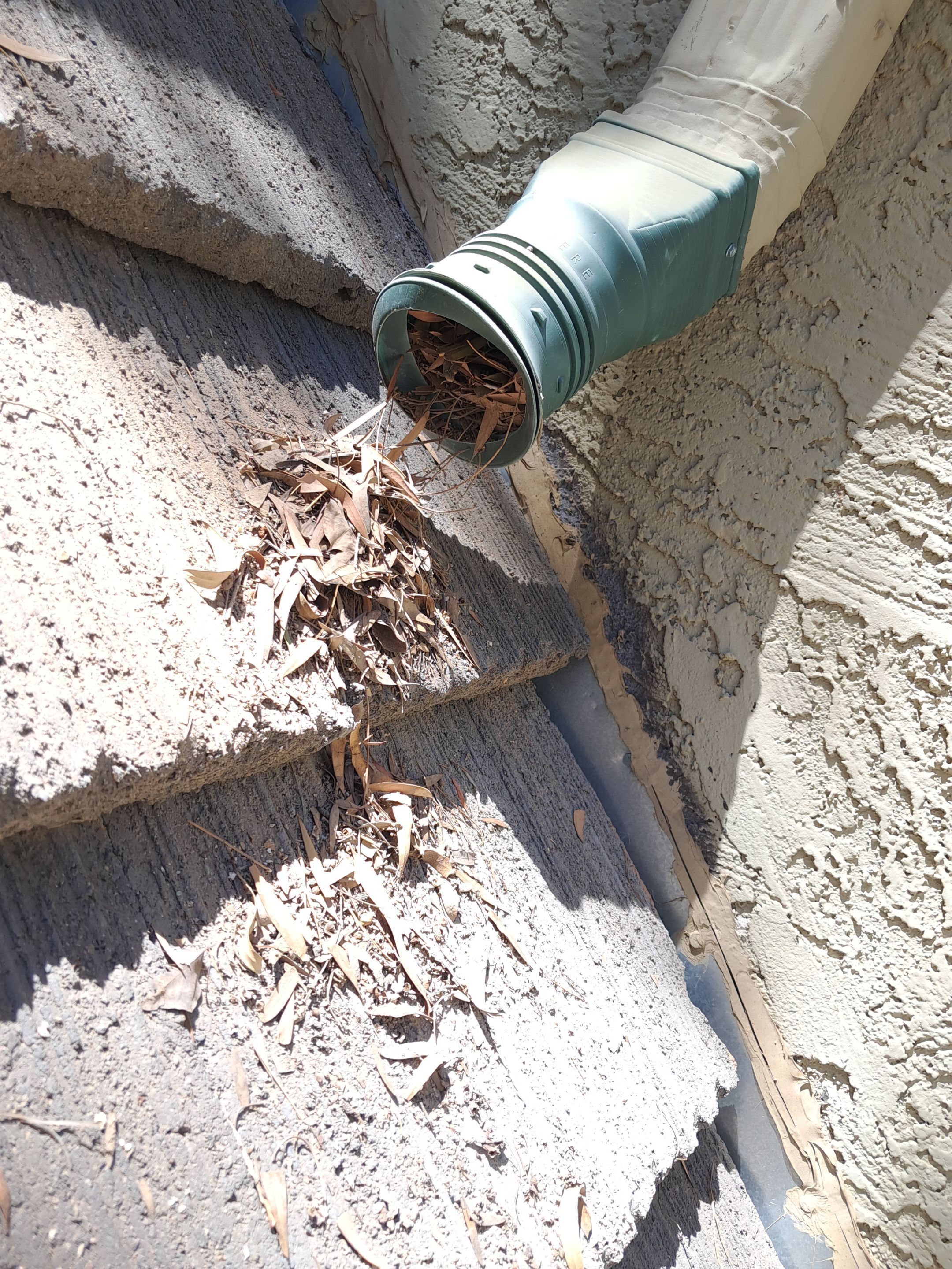 Commercial gutter cleaning Mesa & Gilbert & Chandler, AZ before photo with filled gutters
