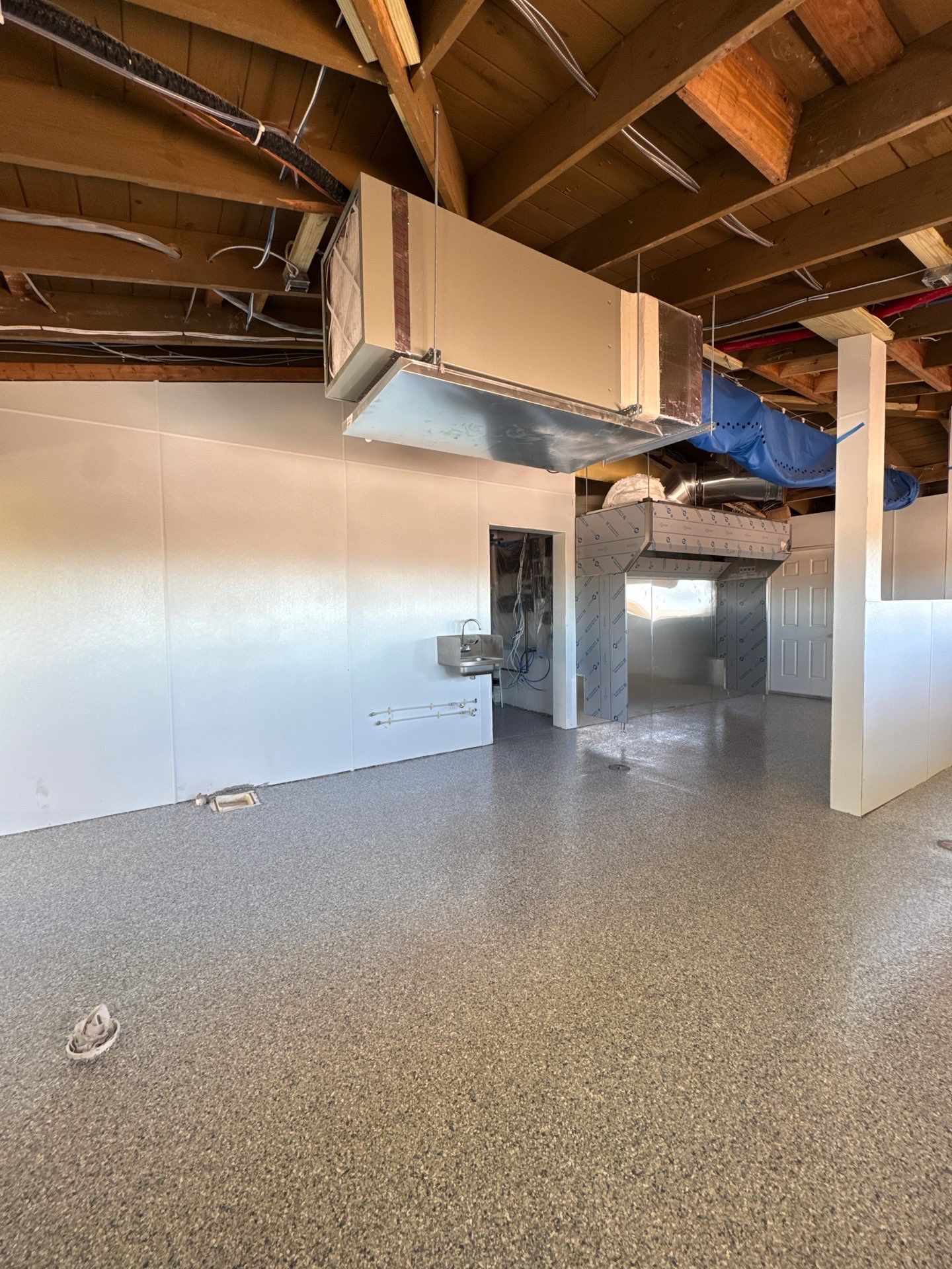 Commercial Restroom Refresh: Seamless 'Tidal Wave' Flake for a Repeat Client by Performance Floors & Coating