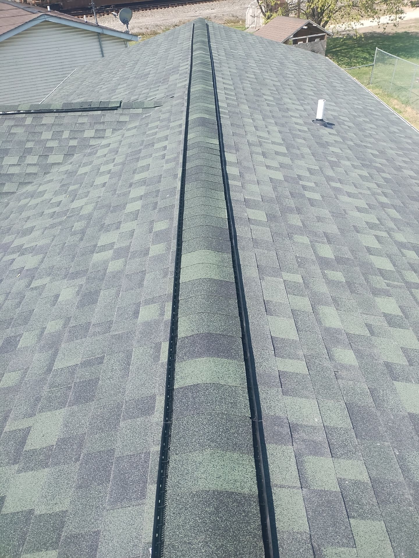 Residential Roofing Installation using Performance Shingles by Mr. Roofer