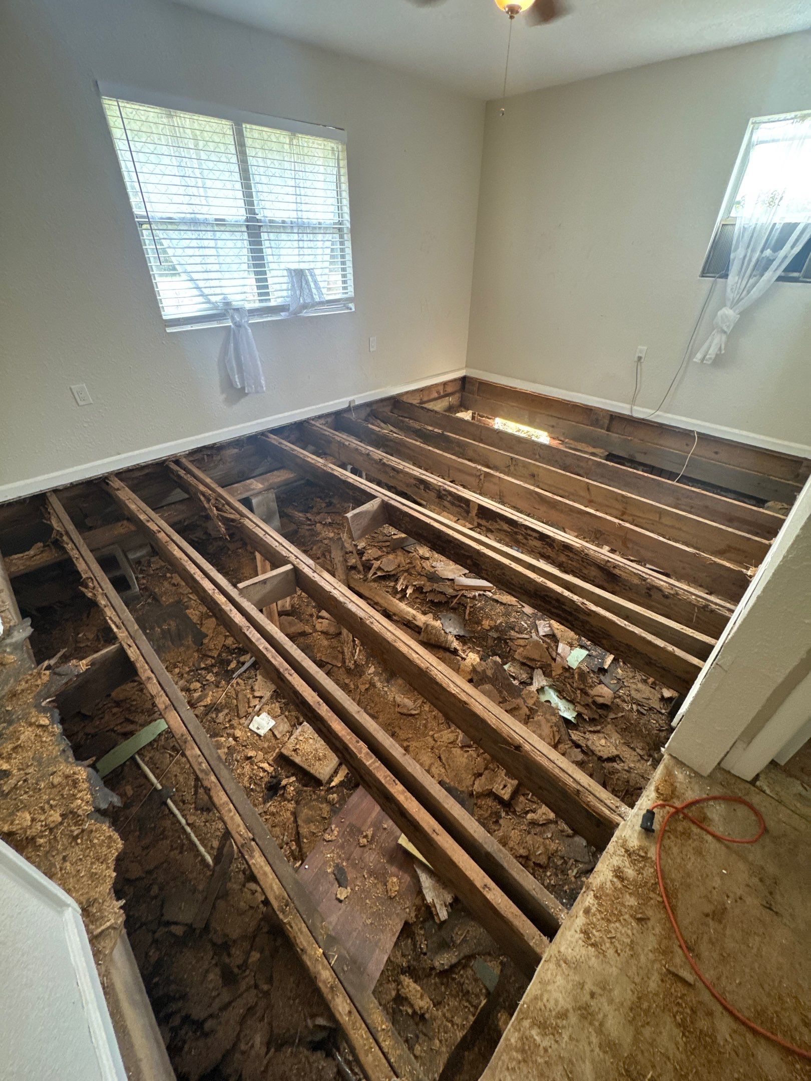 Subfloor Repairs & Flooring Installation by Axtra Hand