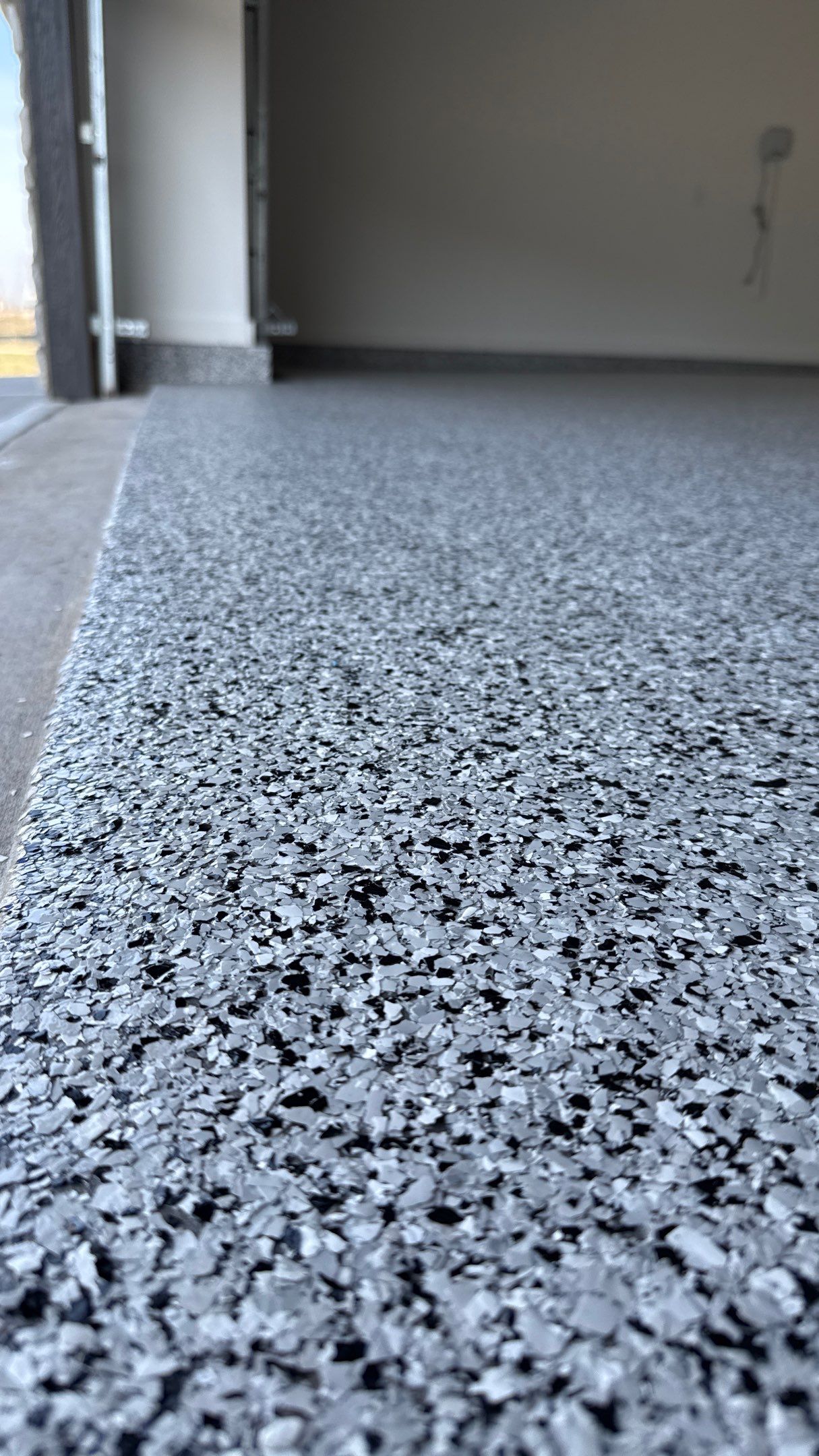 Joe Chose This Amazing Houndstooth Flake Floor by Banner Garage