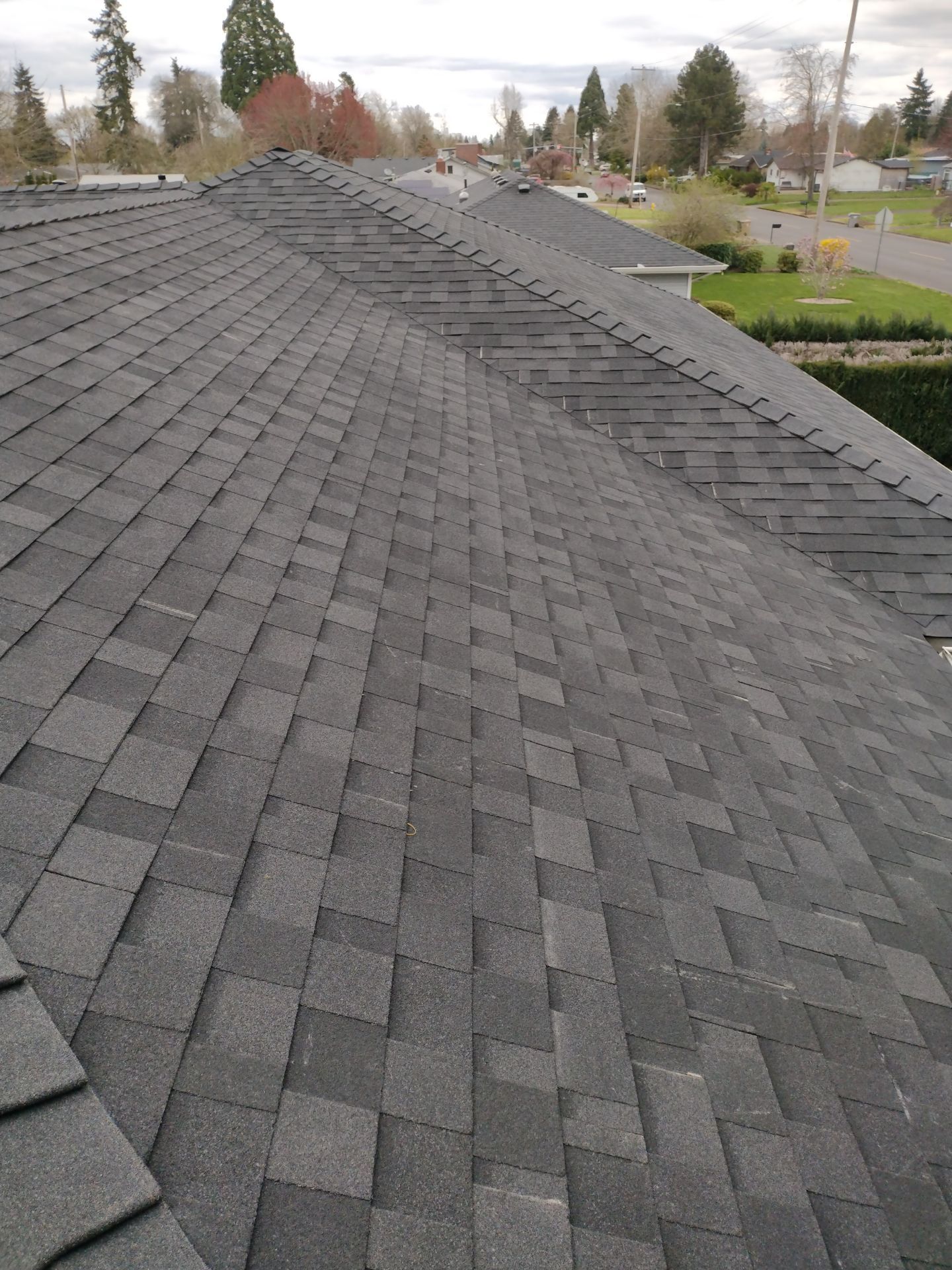 Residential Roofing Installation using IKO Dynasty (Color: Granite Black) by Orezona Building & Roofing Company, Inc.
