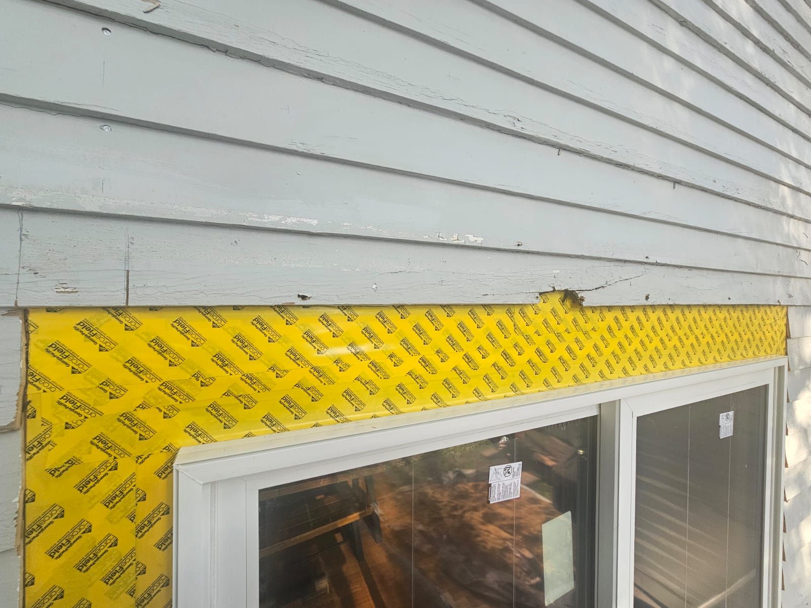 Patio Slider Door and Rear Deck  by Avalon Roofing and Exteriors