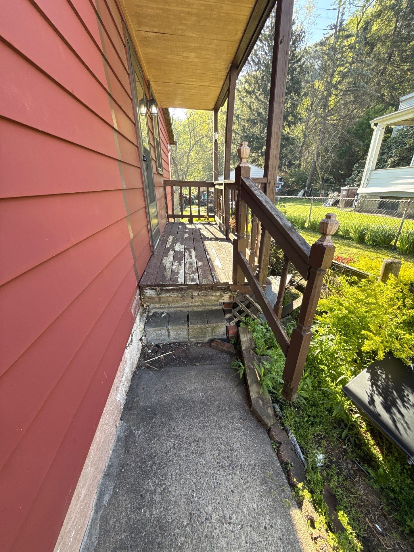 Roof sunspace deck  by Cousins Roofing Siding & Decks