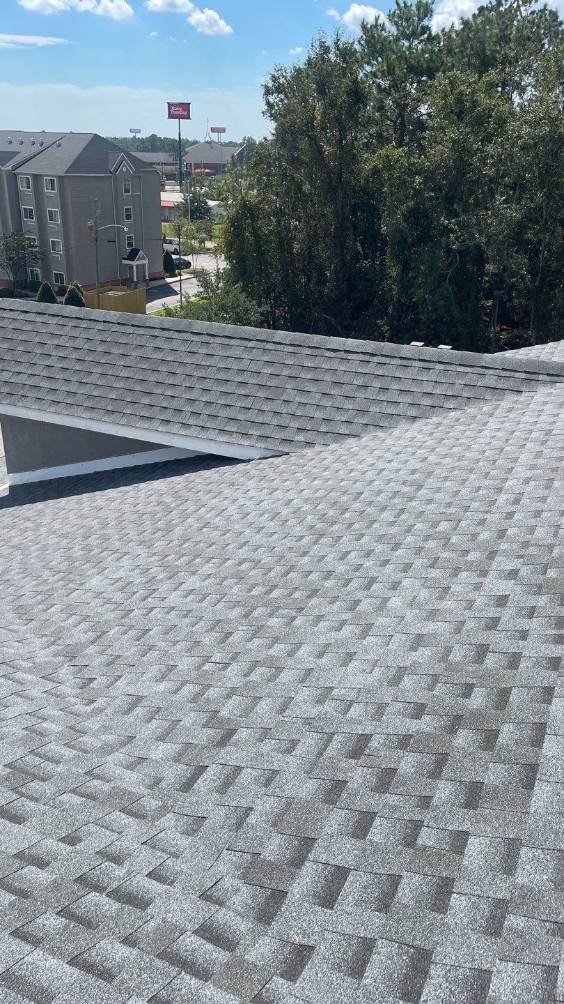 Commercial Roofing Installation using Roof Replacement by American Roofing & Construction LLC