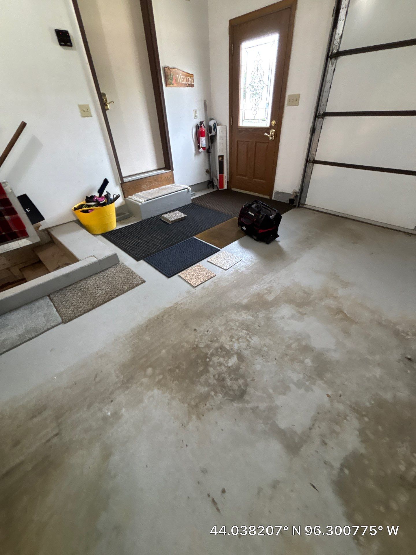 Custom Polyaspartic Garage Floor and Stairwell Coating in Pipestone by Select Painting, Coatings & Garage Cabinets