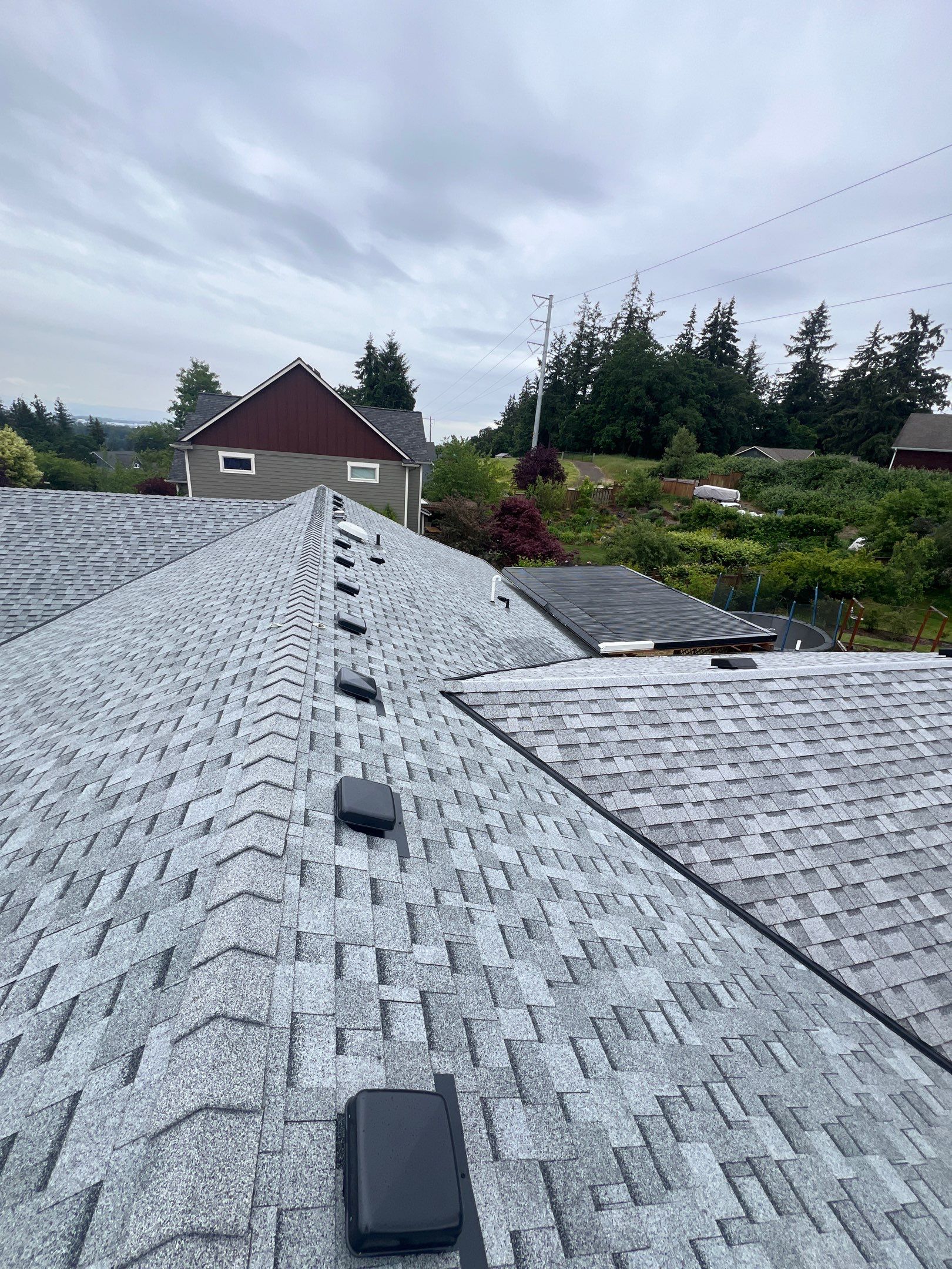 Residential Roofing Installation using IKO Cambridge (Color: Dual Grey) by Orezona Building & Roofing Company, Inc.