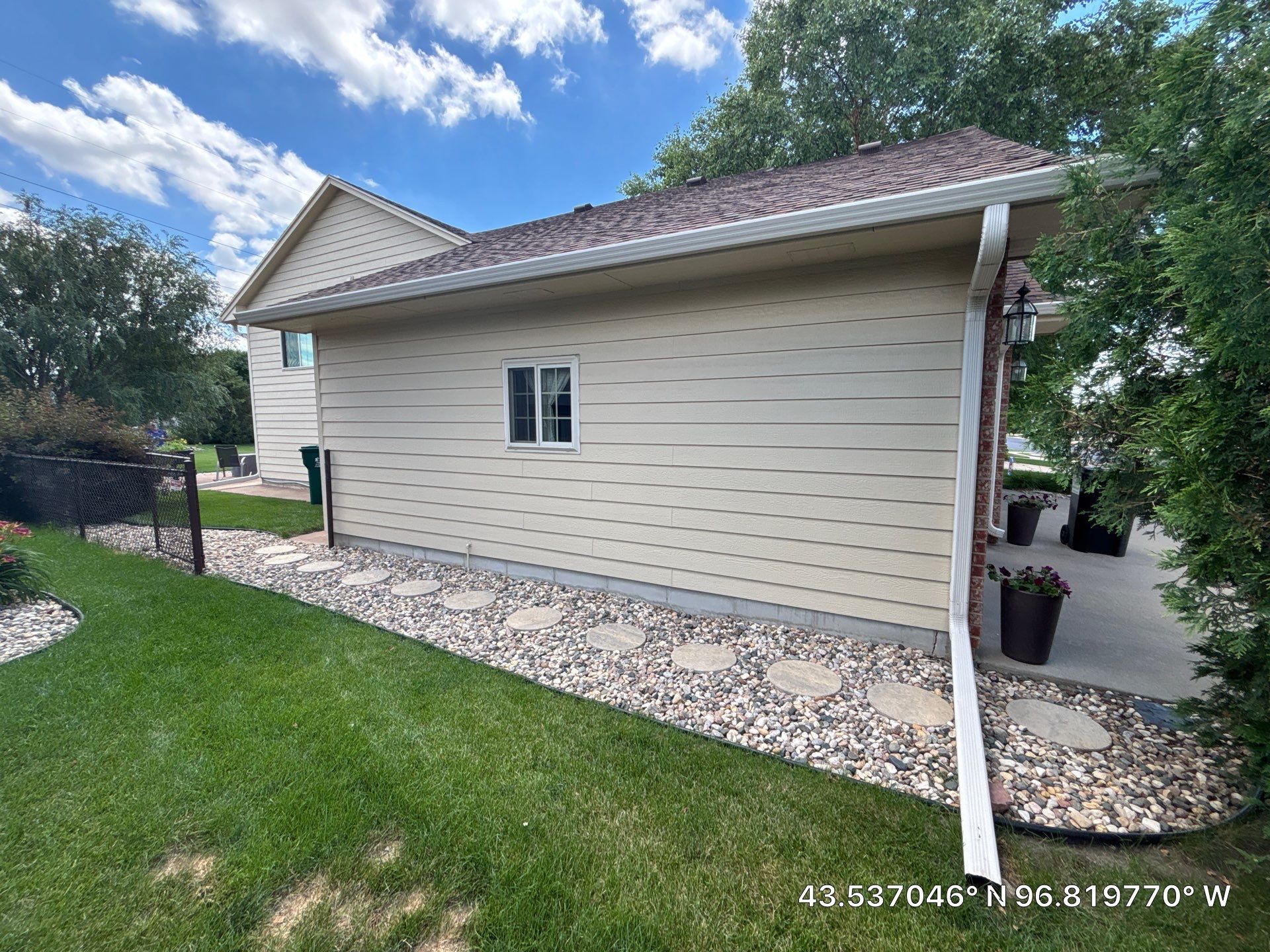 Sioux Falls Exterior Siding Replacement and Custom Deck Upgrade by Select Painting, Coatings & Garage Cabinets