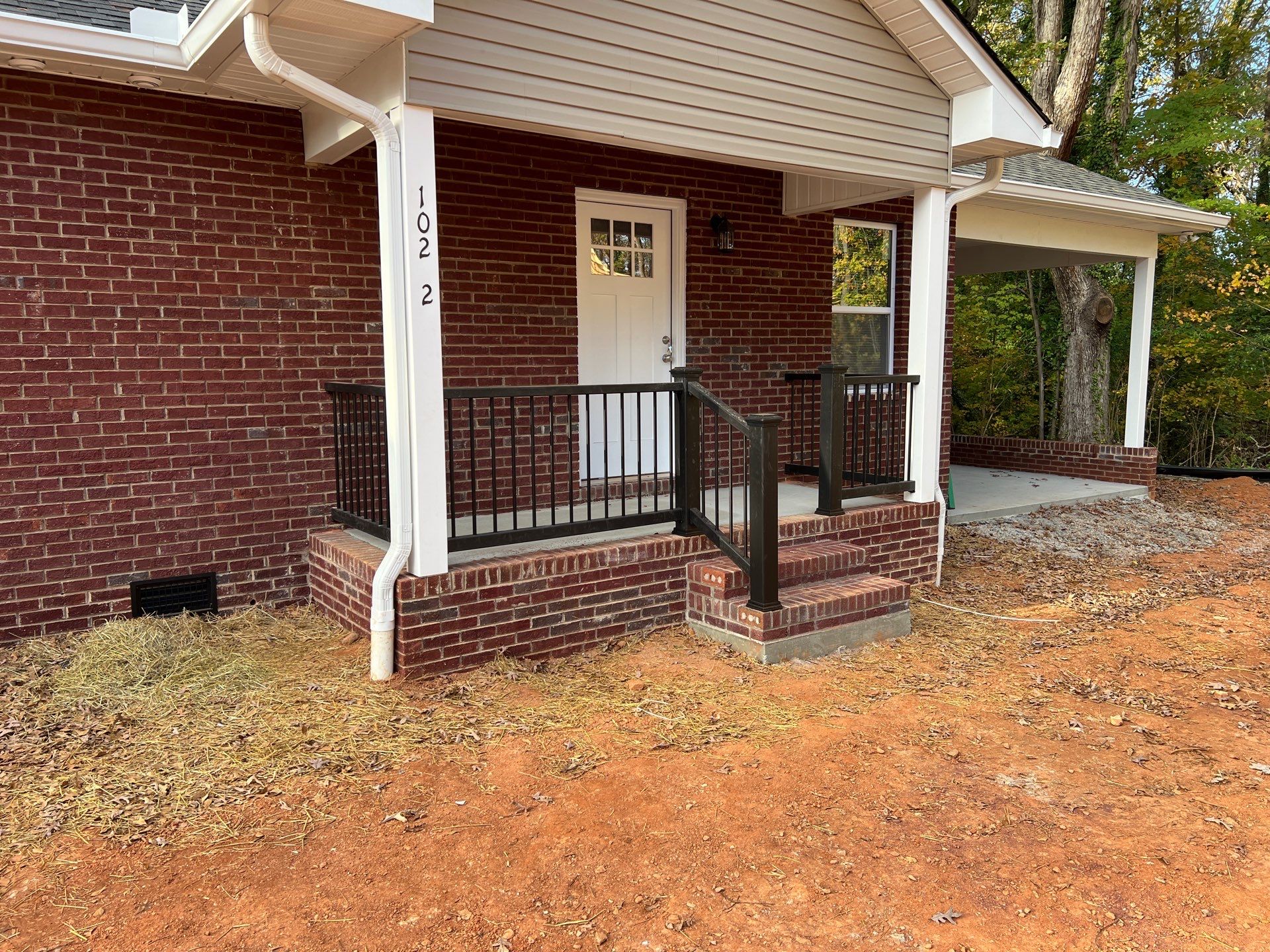 Brick Duplex New Construction by JWH Contracting LLC