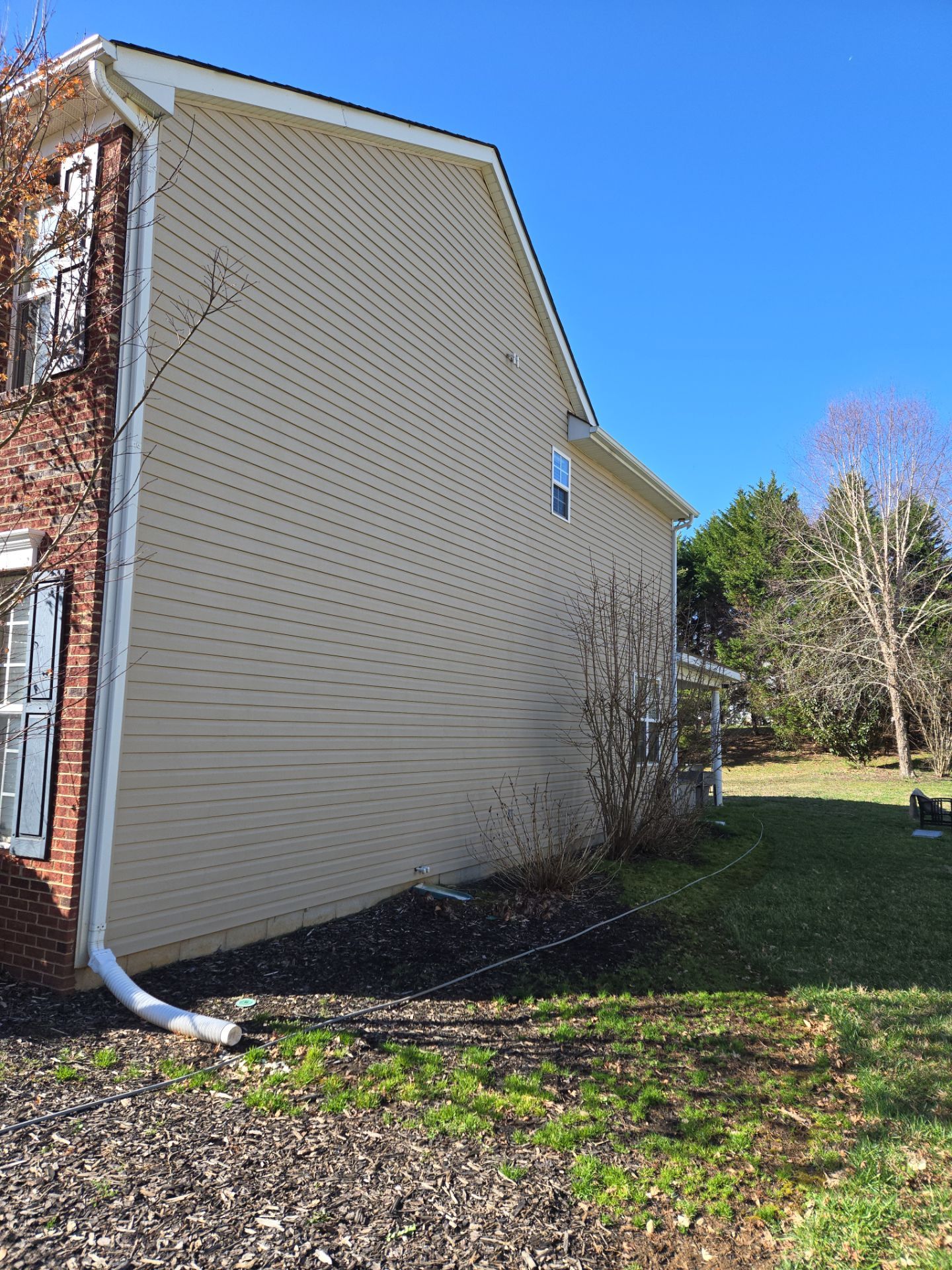 House Wash using cleaner by Power Wash Masters LLC