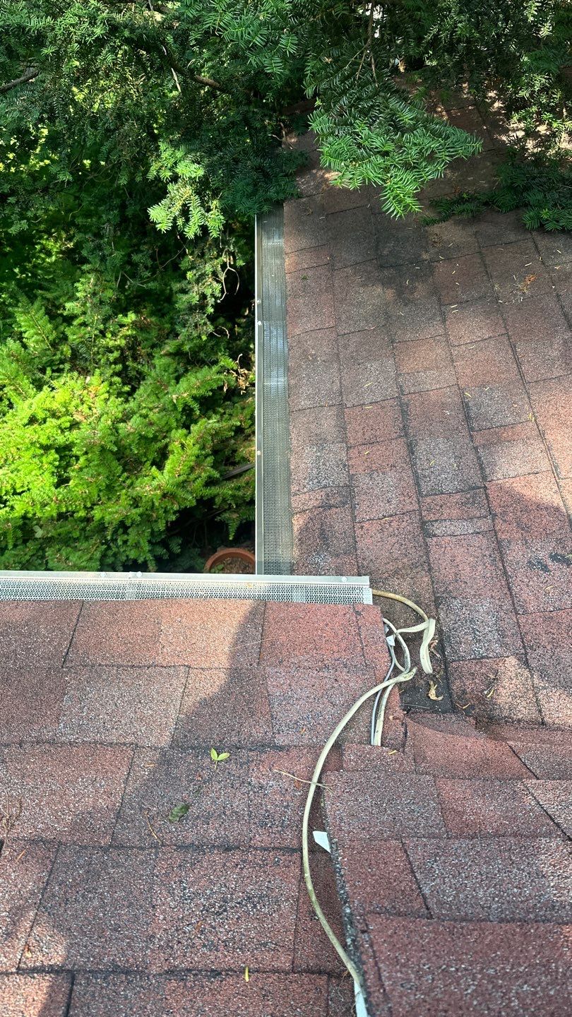 Very overdue gutter cleaning and screening by Above All Gutters 