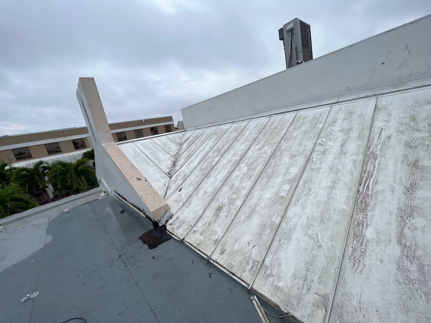 Commercial Roofing Repair using Roof Sealant by Four Peaks Roofing