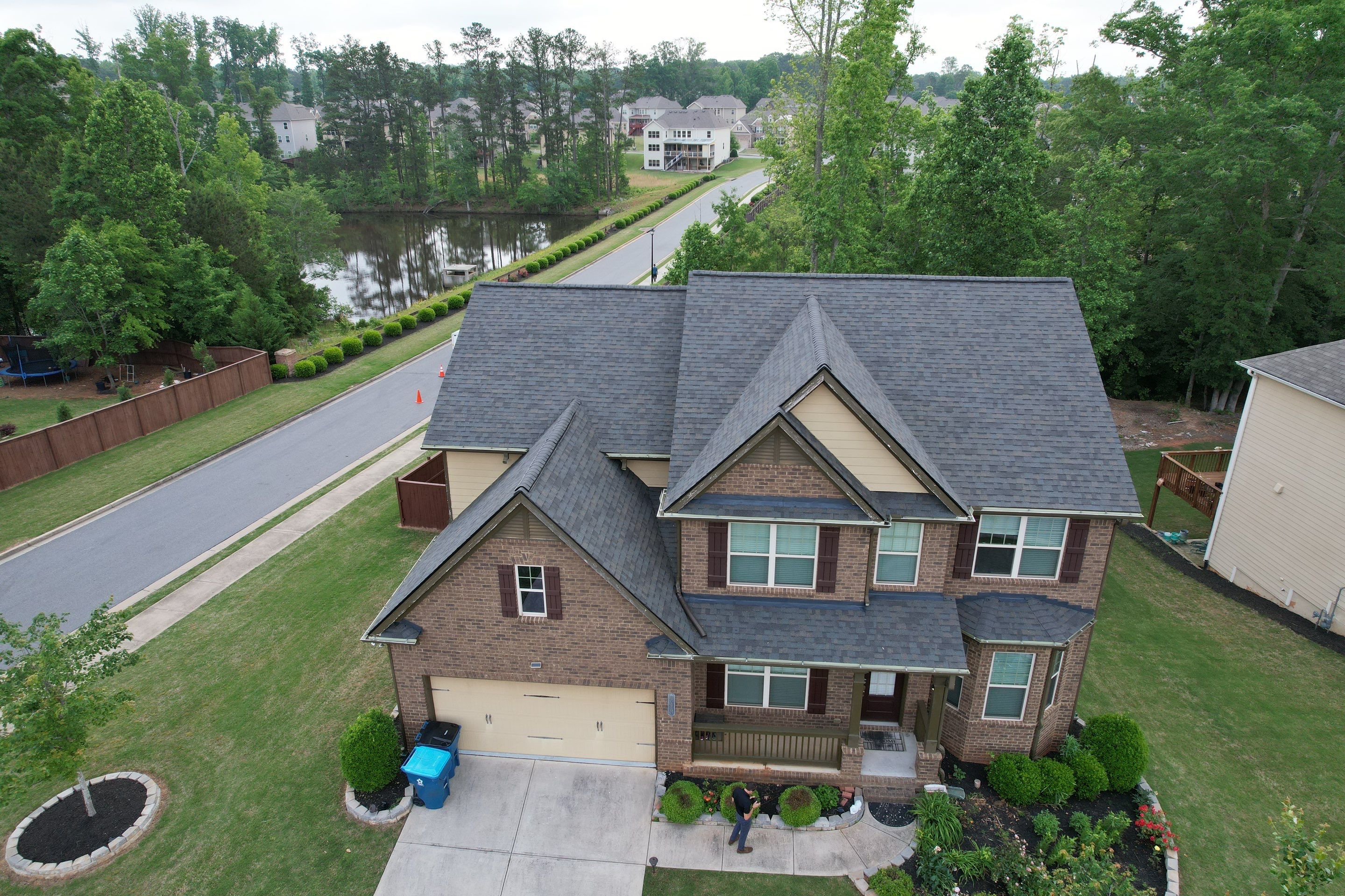 Residential Roofing Installation using Owens Corning TruDef Peppermill Gray by Inspector Roofing and Restoration