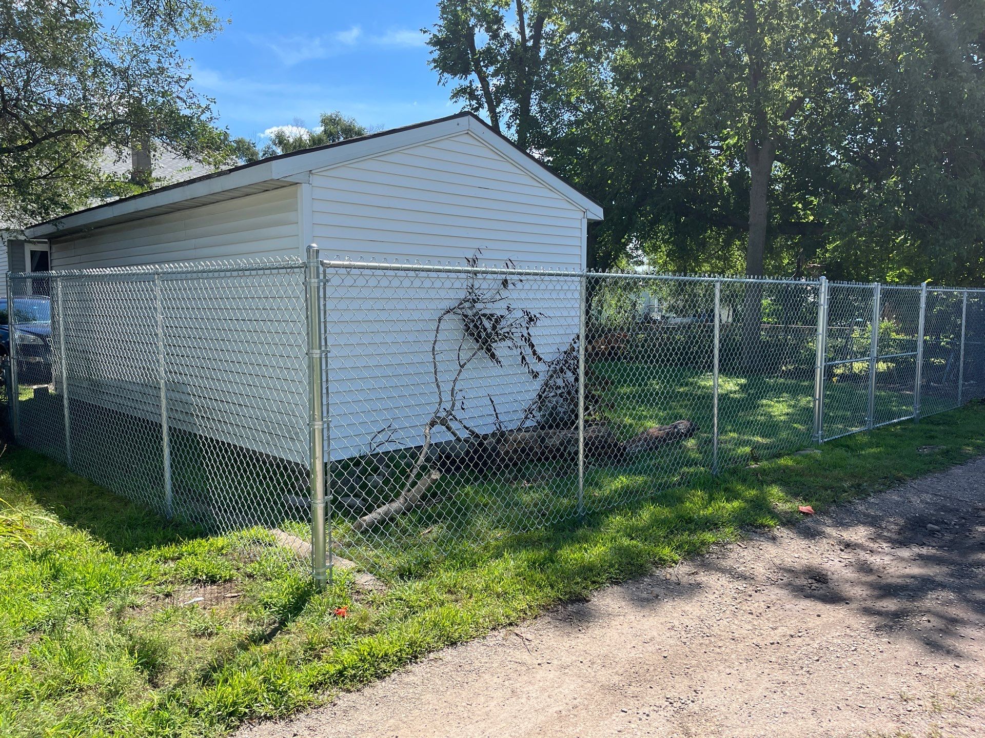 Galvanized Chain Link Fence Installation and Site Clearing in Waterloo by Perfect Picket Fence and Stain