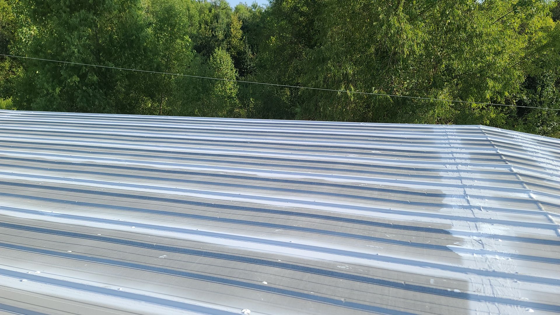 Commercial Metal Restoration System using Aldocoat Coatings by Hostetler Roofing