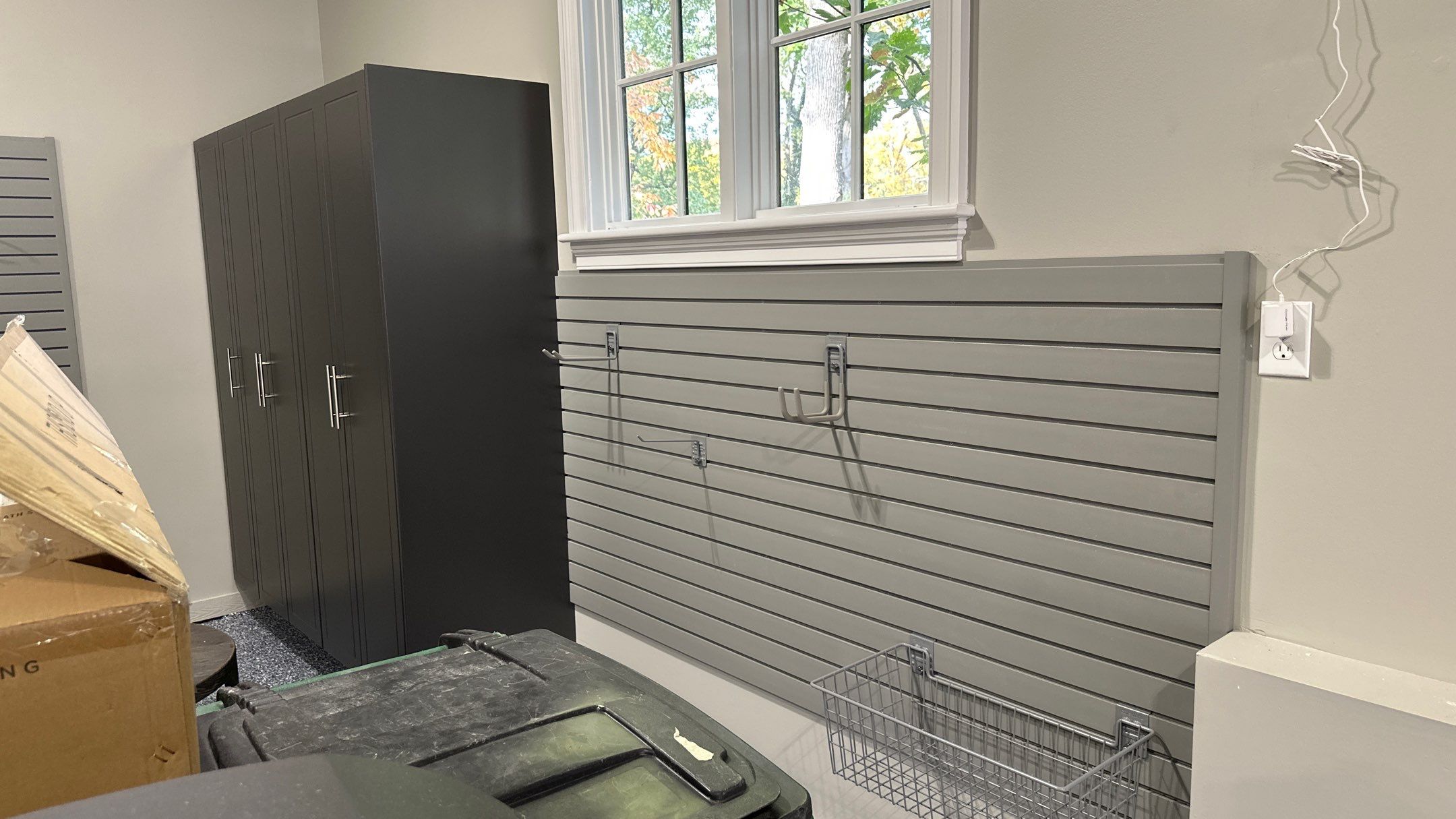 Matt F. added cabinets and slotwall to his garage by Banner Garage