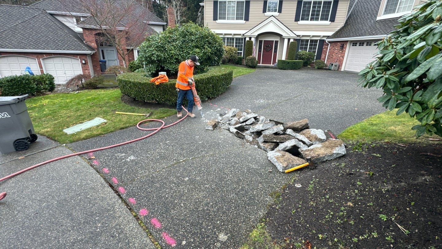 Concrete Driveway Patch Repair & Sealer | Mukilteo  by Jireh Asphalt & Concrete Inc 