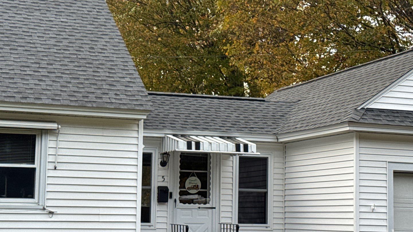 Complete Roof Replacement with GAF Pewter Gray HDZ™ Shingles, VELUX Skylights & New Gutters by Sensible Home Solutions