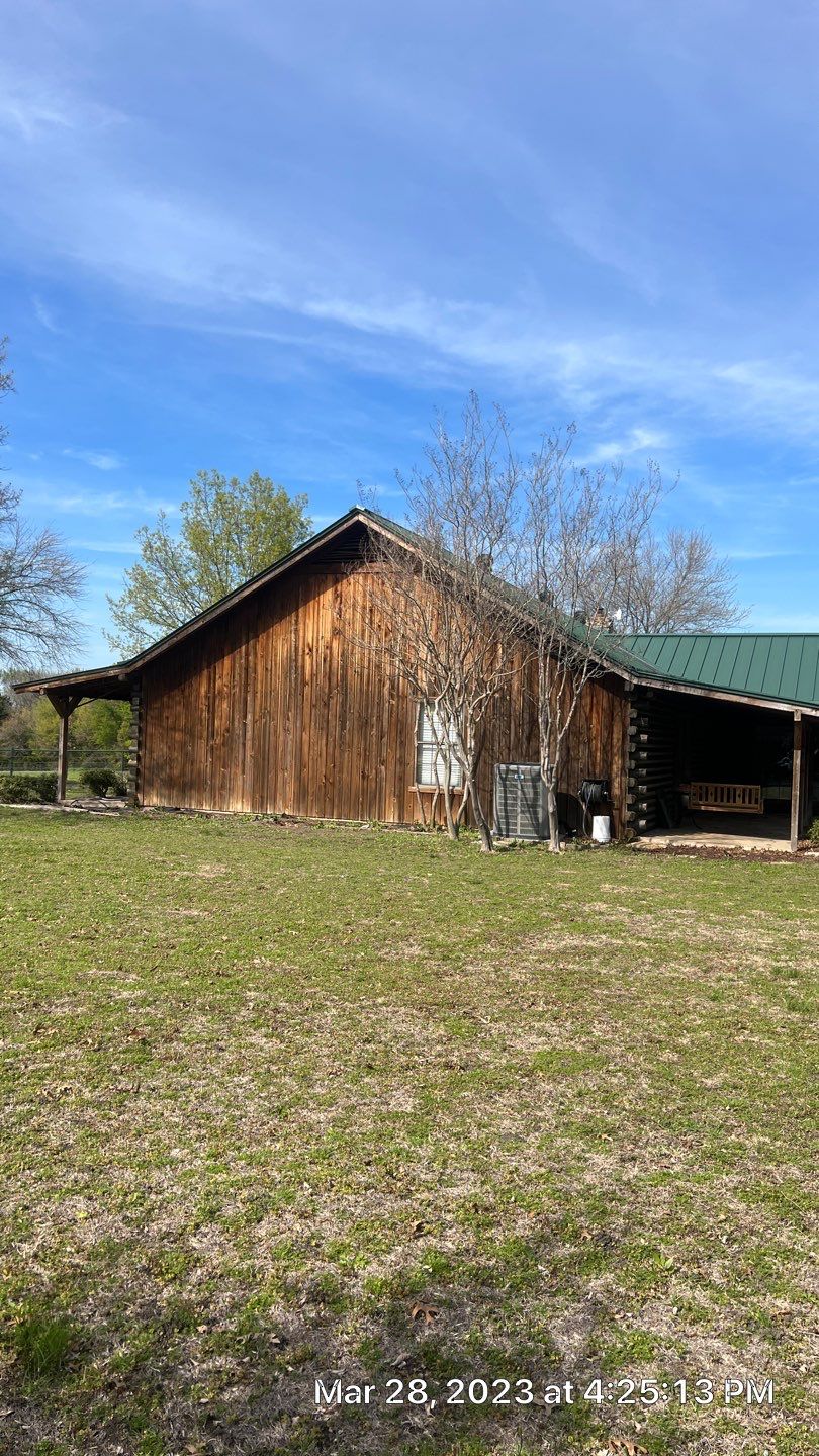 Shingle to Standing Seam Metal Roof by Springtree Restoration