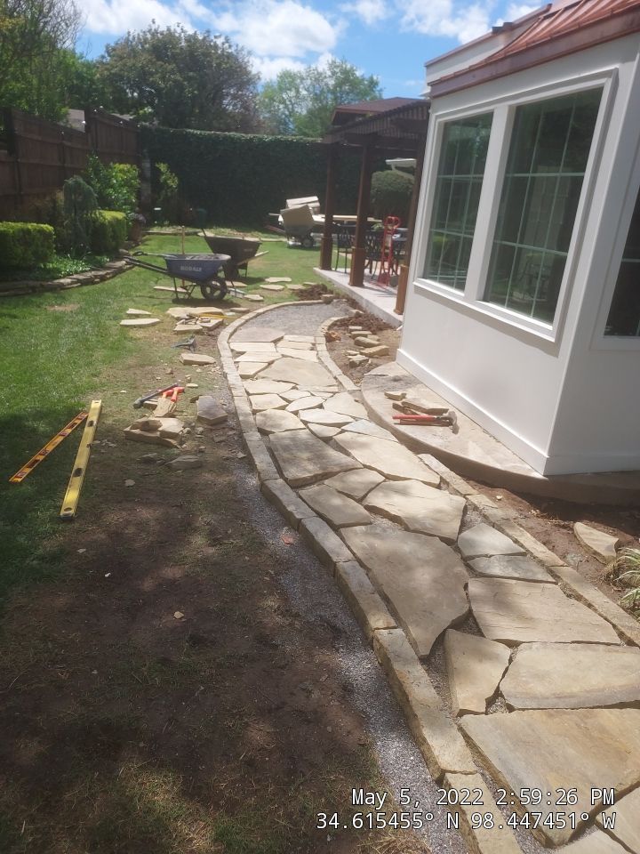 Flagstone walkway using Flagstone  by Clays Services Inc