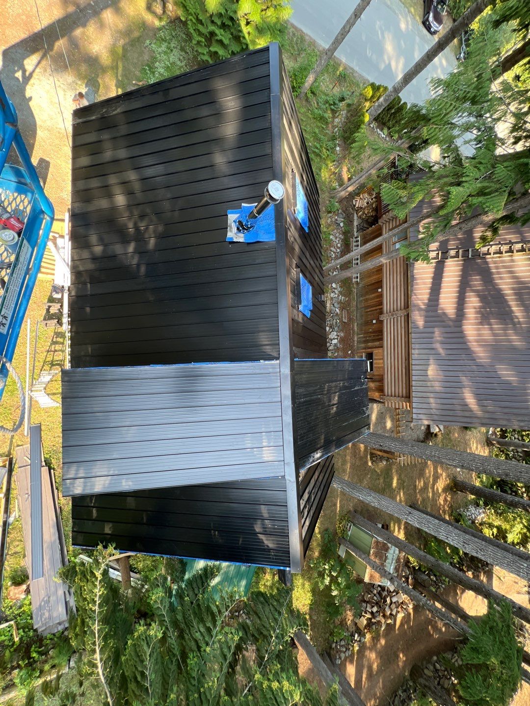 Residential ReRoofing Installation using 12" Prolok metal  by Top Notch Roofing Inc