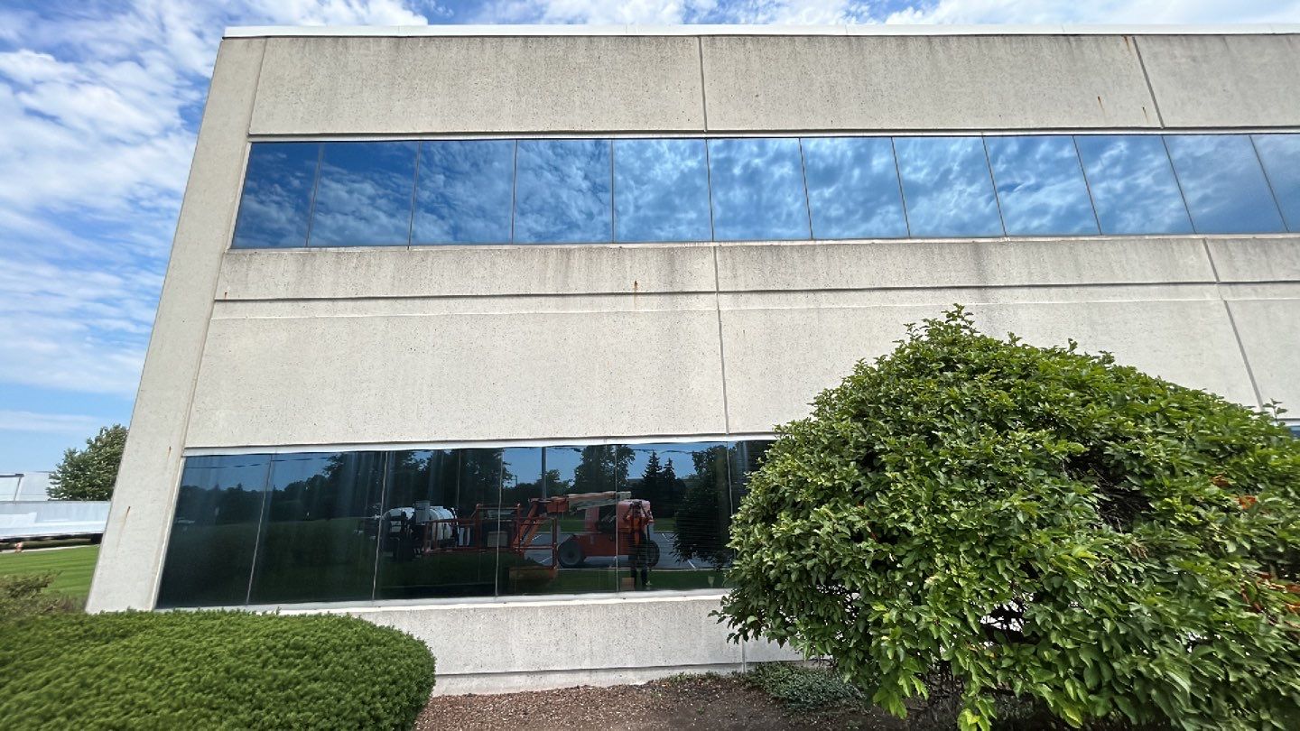 commercial pressure washing using Algaecide, soft wash soap by Northern Power Washing LLC.