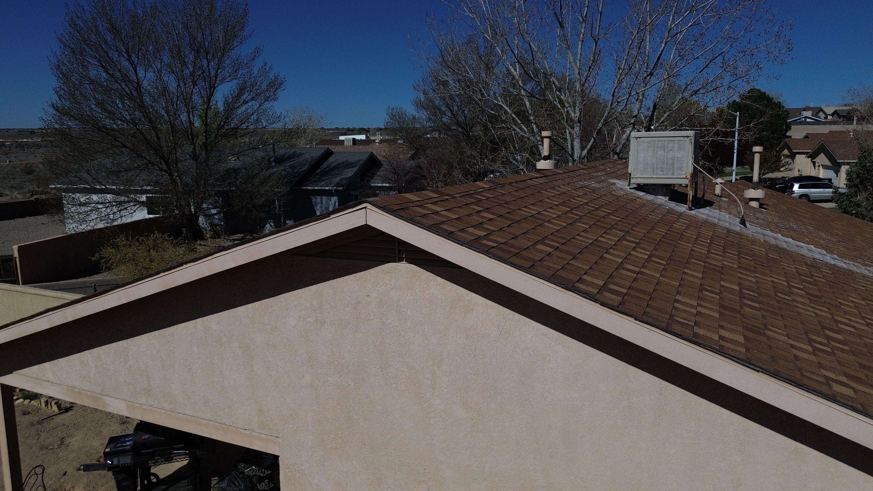 Oakridge Desert tan shingles in Chimayo Meadows by Doyle Roof Masters Inc