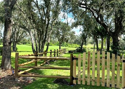 Wood Fence Installation using Wood 3 Rail Ranch Fence