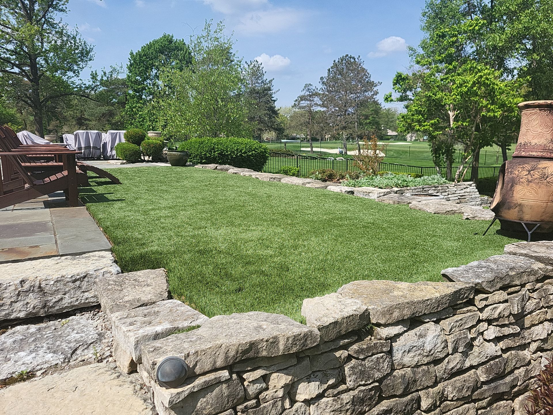 Muirfield Village backyard by Southwest Greens Midwest