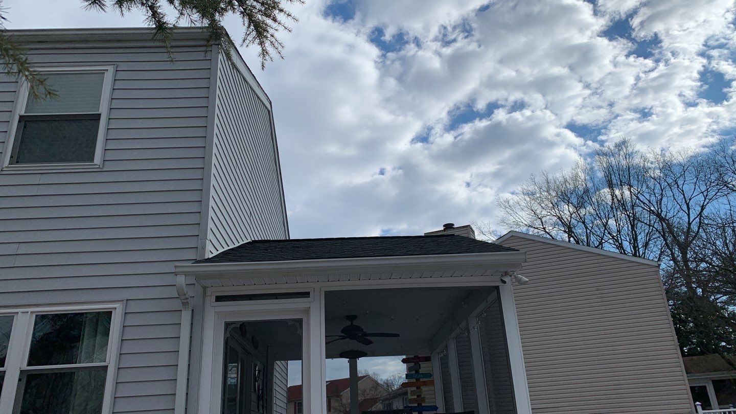 Roof Replacement with GAF Decotech integrated solar panels by American Home Contractors