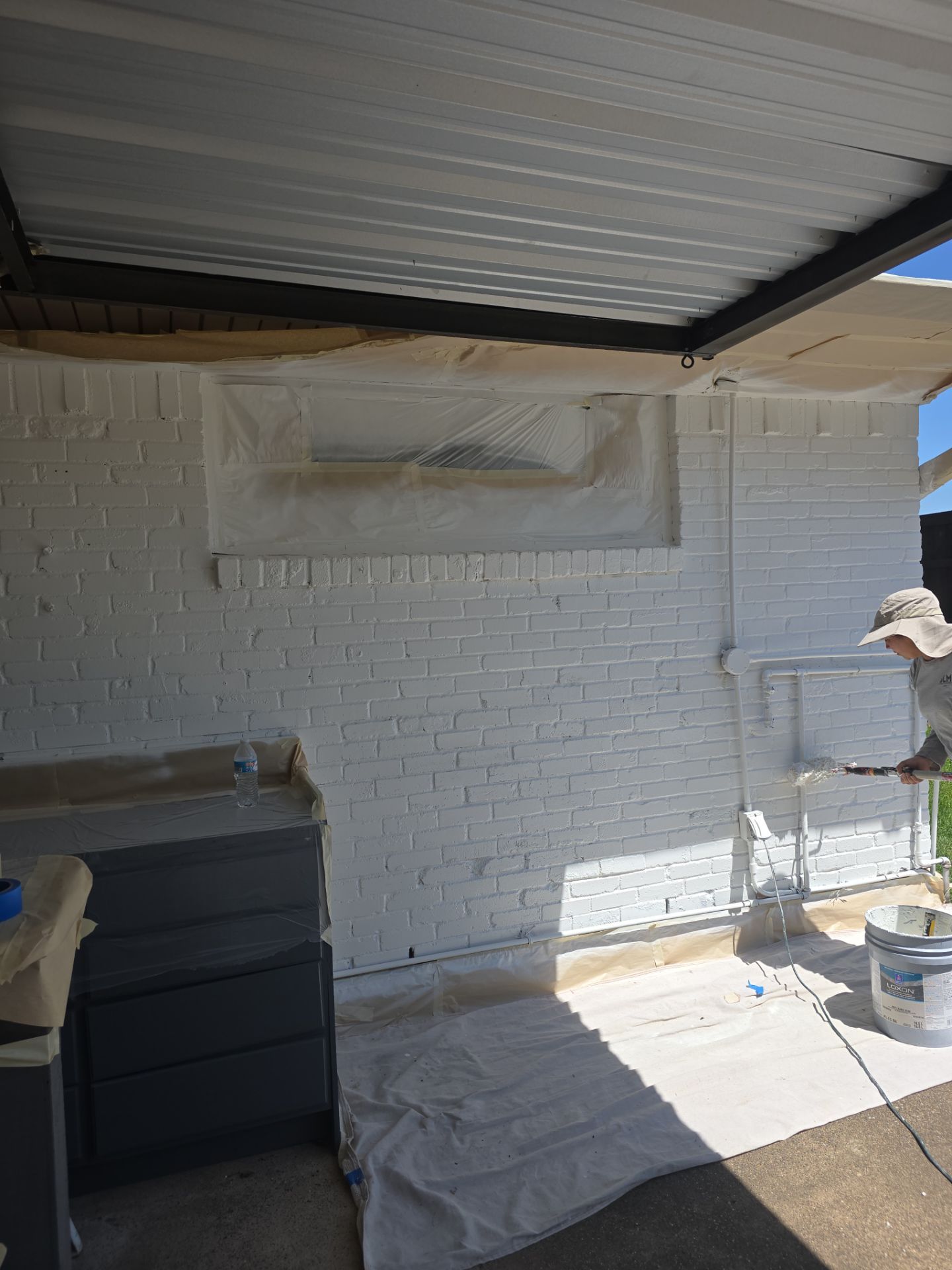 Exterior Home Paint Project with Different Surfaces by SLM General Contractors & Roofing