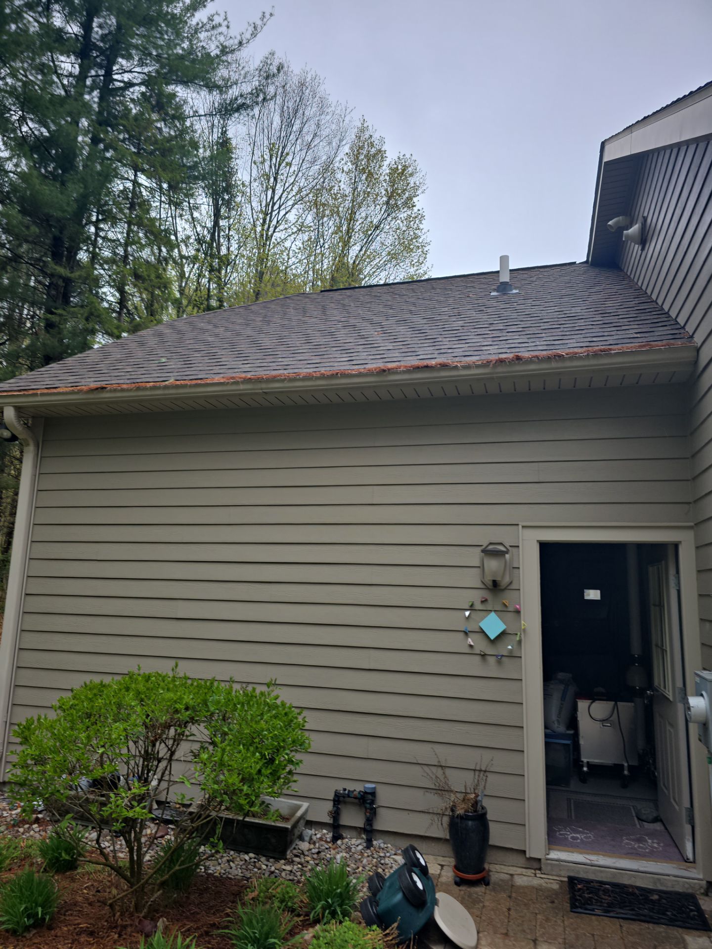 Gutter Helmet Installation on a Multi-Level Traverse City Residence by Rainbow Seamless Systems