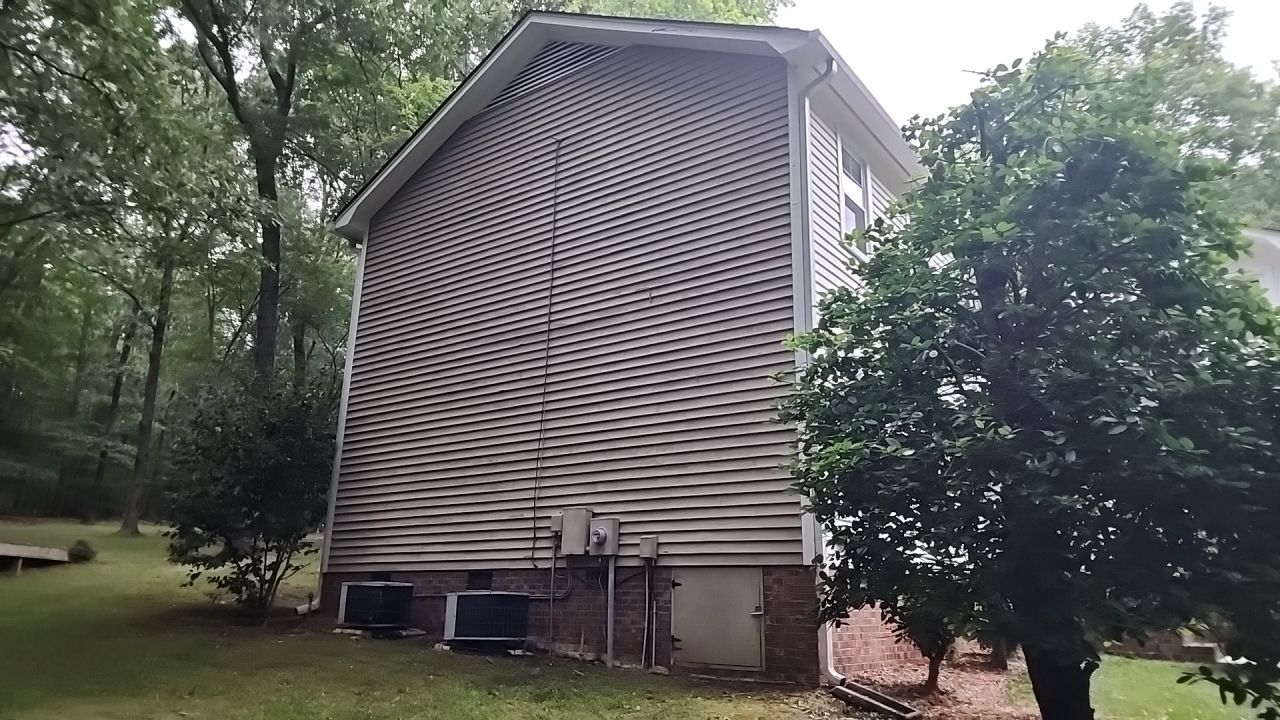 House Wash using cleaner by Power Wash Masters LLC