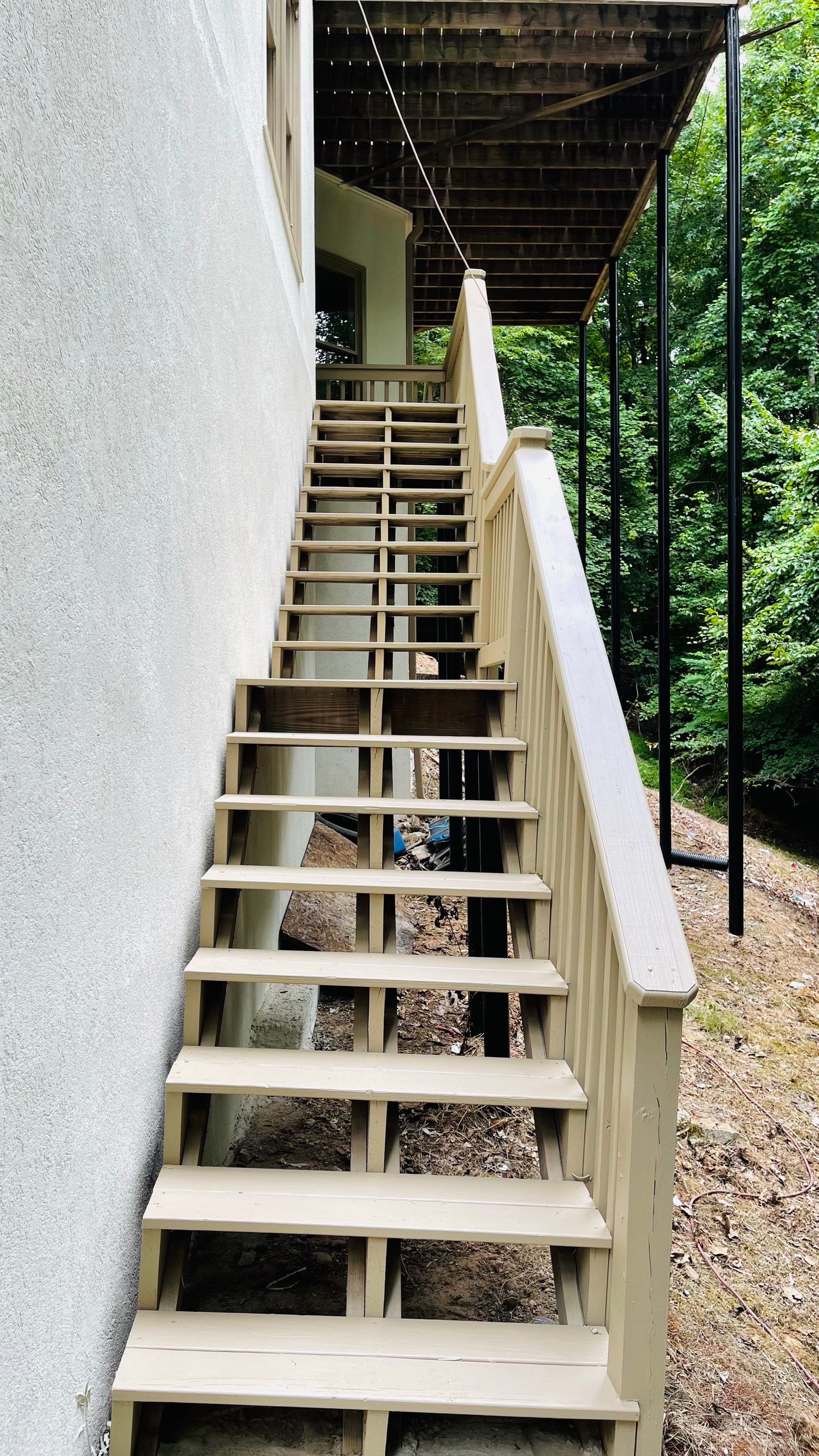 Stucco Exterior Painting and Deck Refinishing in Duluth by Swift Home Renovations