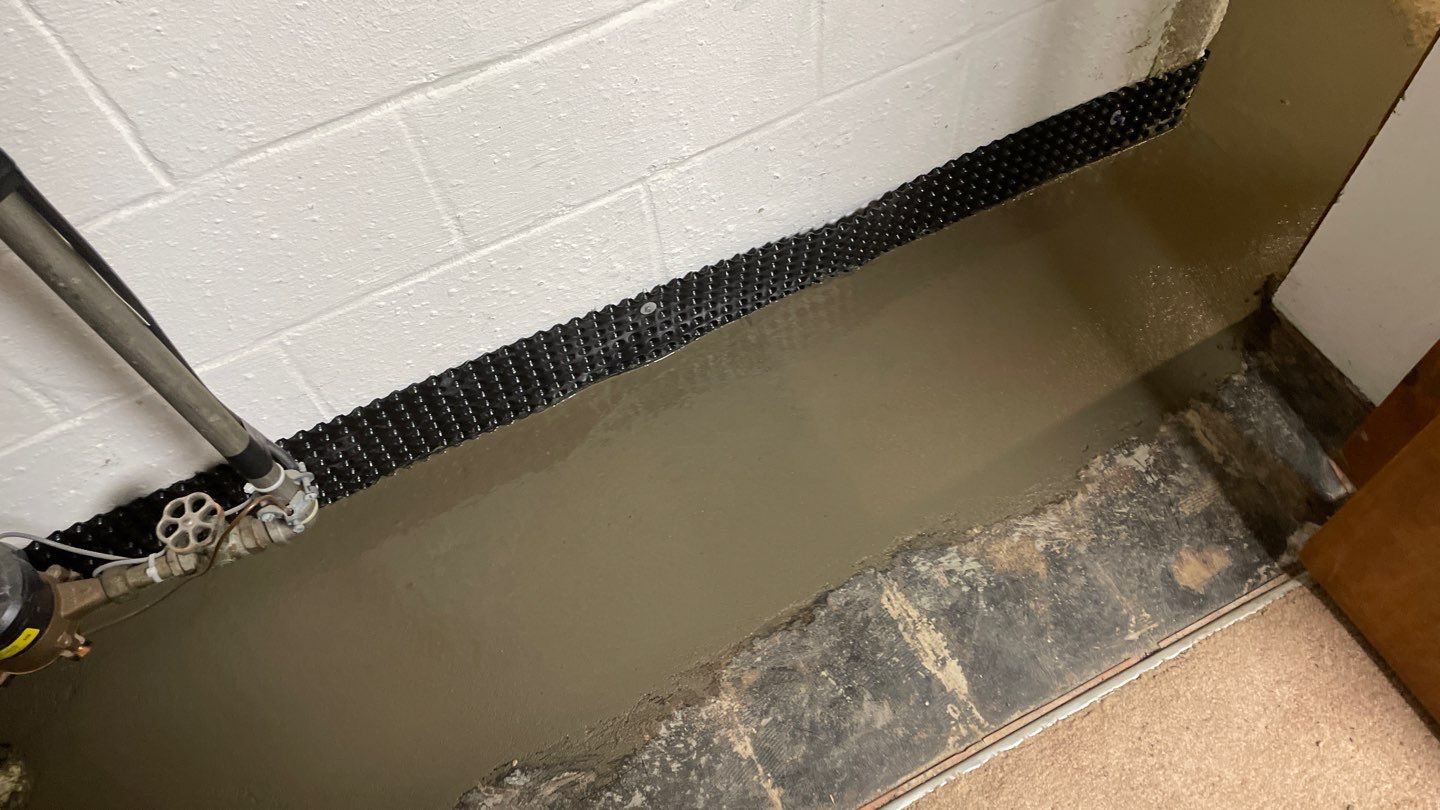 Drain Tile & a Sump Pump for our Property Management Partner by Waterproofing Northeast