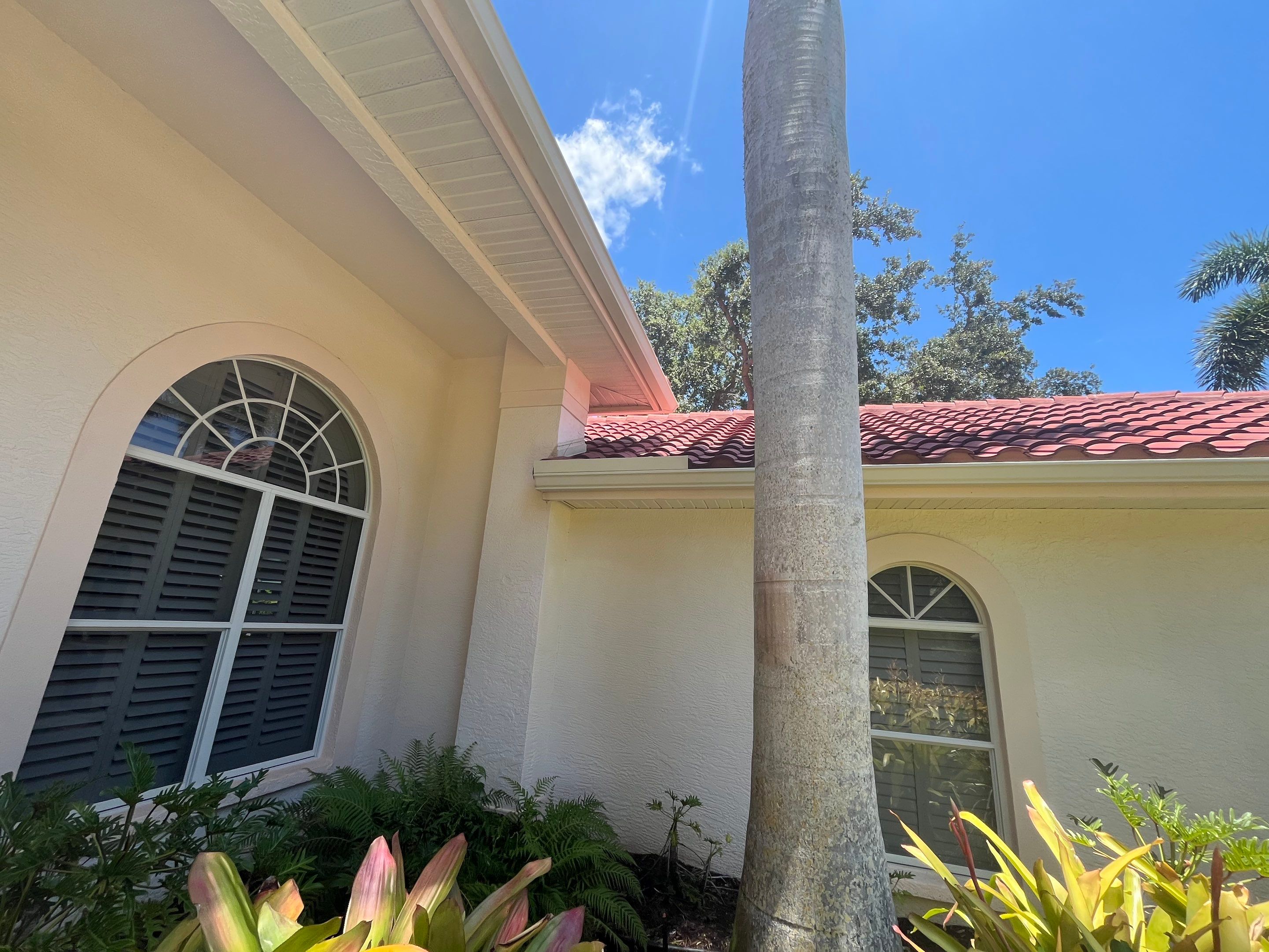 Splash Guard Gutters for Rainy Season Protection in Osprey FL by Gutter Professors