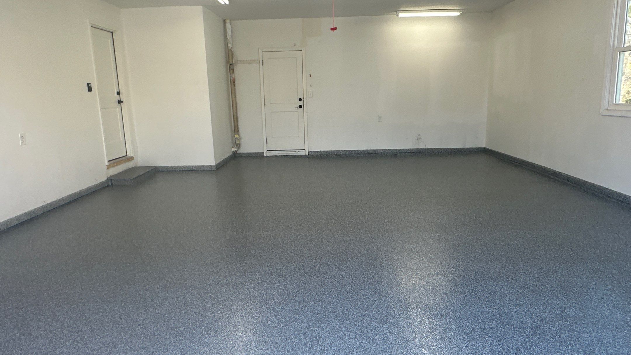 Check Out Anne's New Polar Floor by Banner Garage