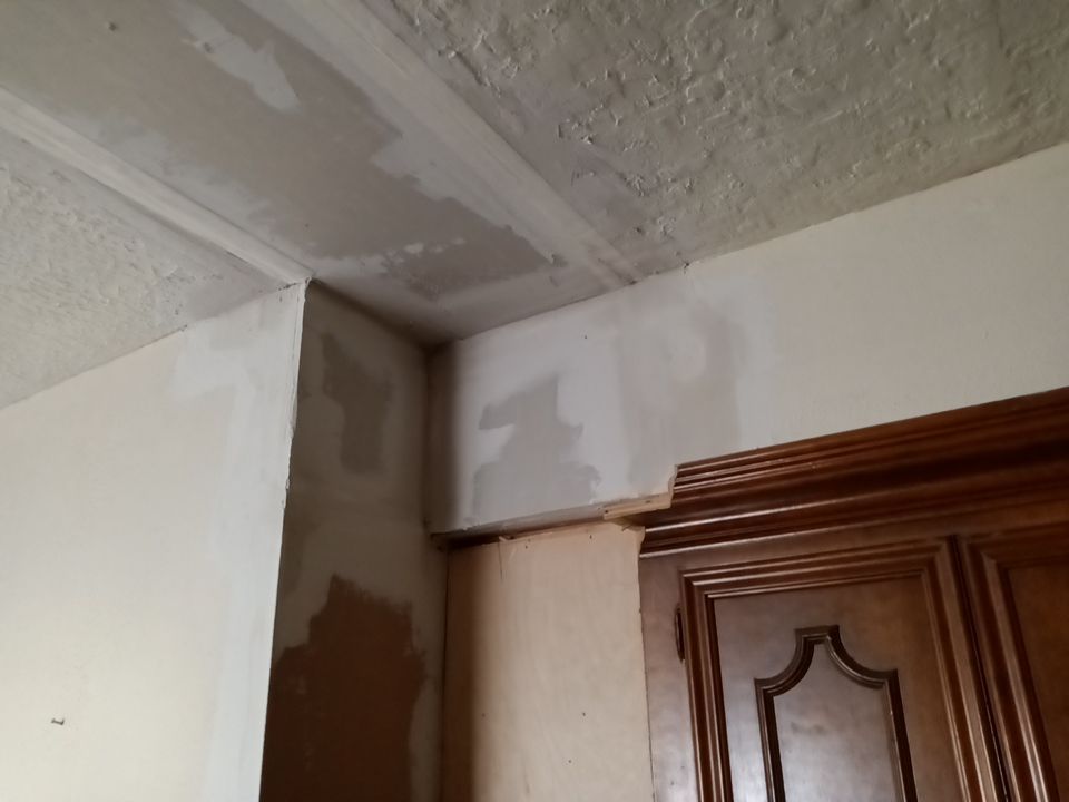 Interior and exterior painting project by Roof Concepts Construction