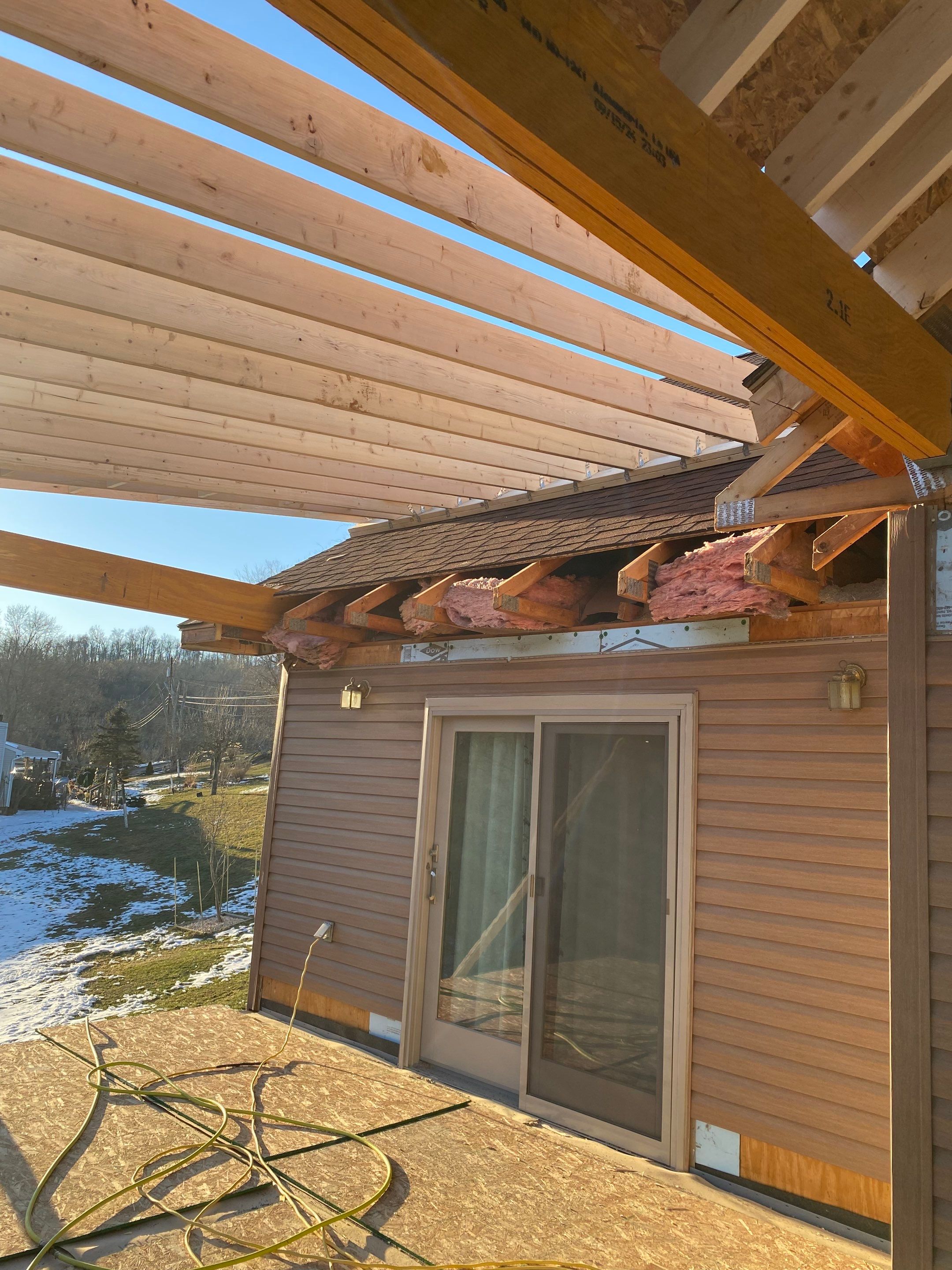 Deck and Roof Build by Cousins Roofing Siding & Decks