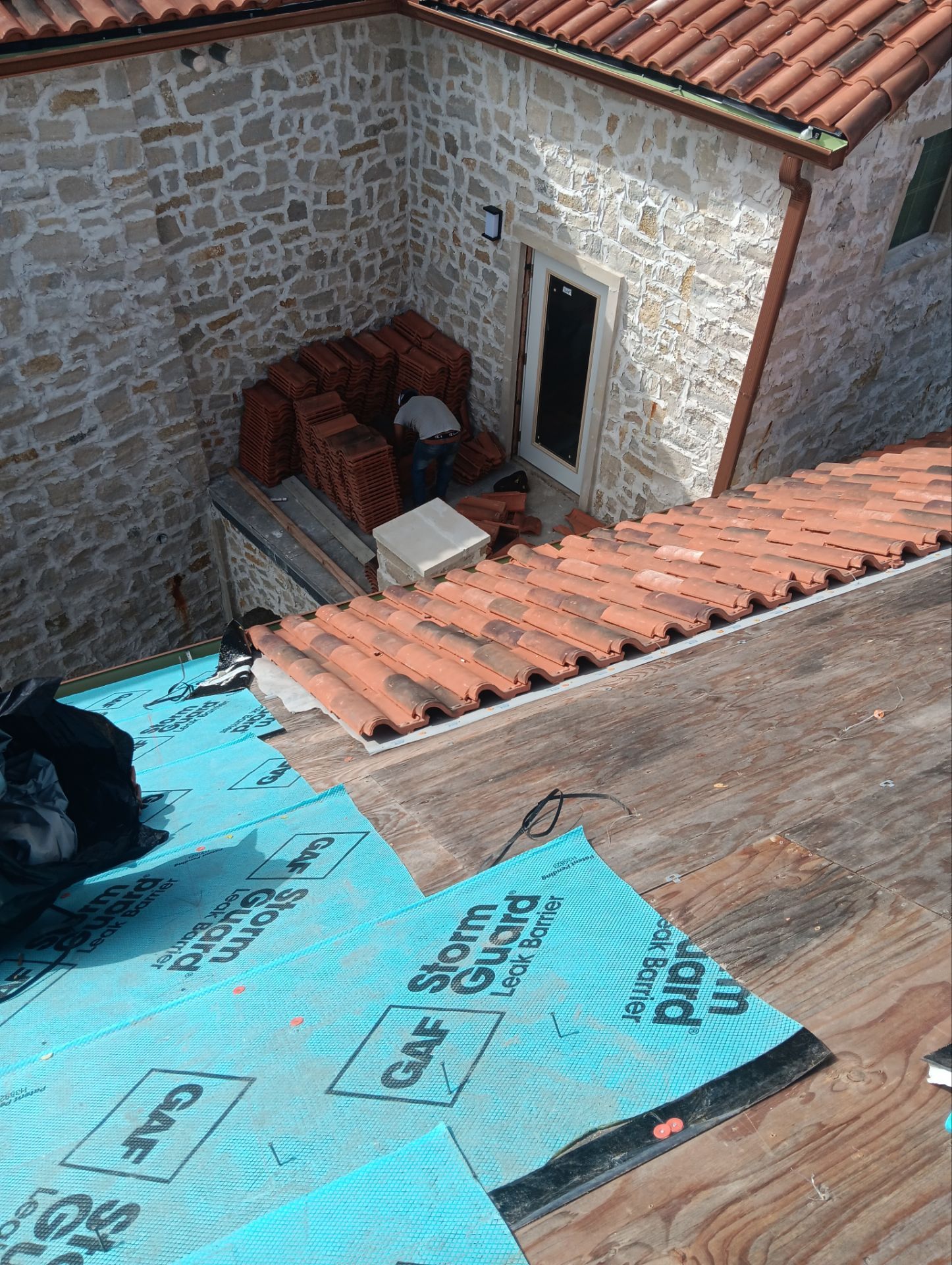 Residential Roofing Repair using tile by Roof Repair Company