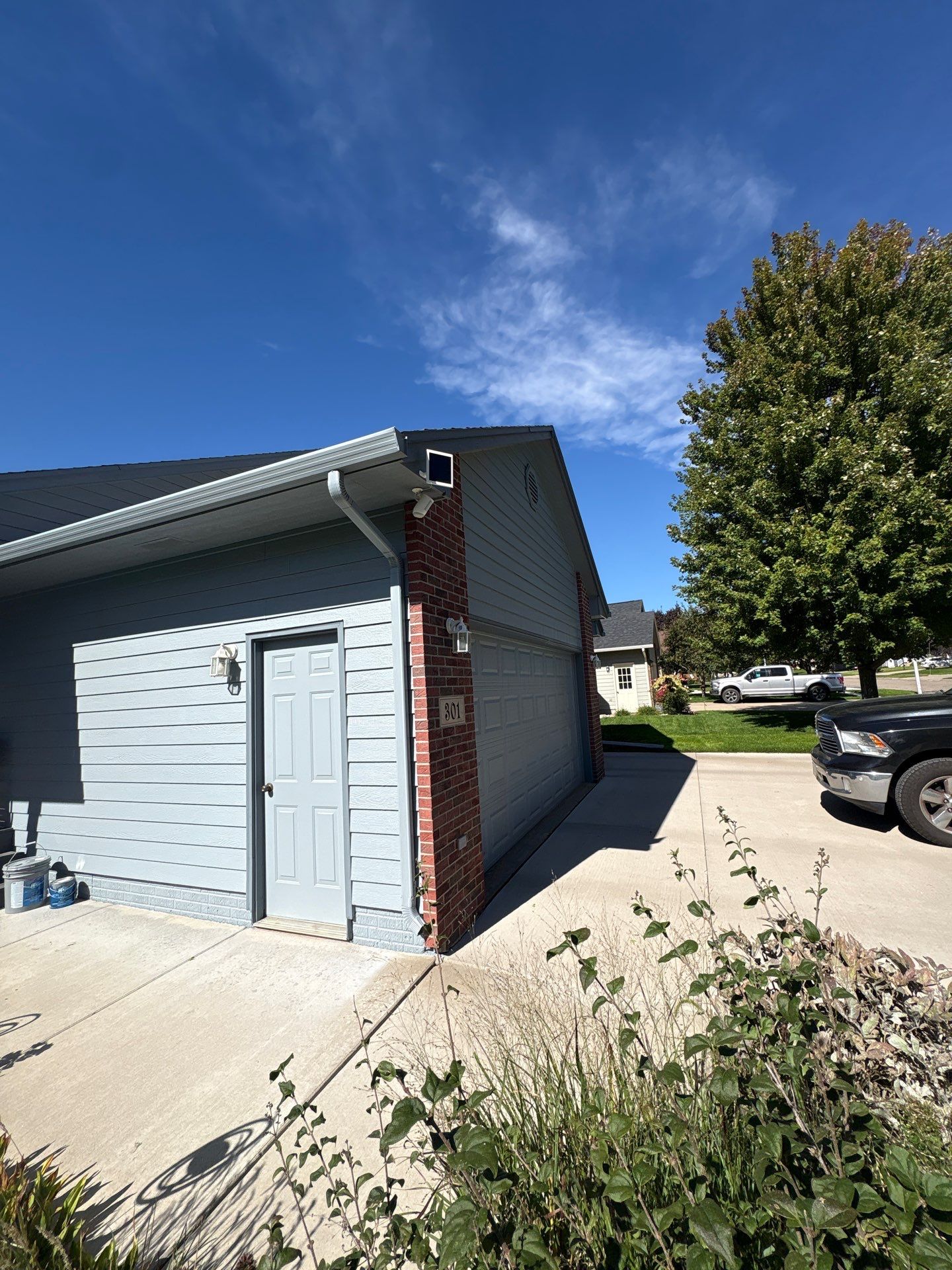 Exterior Painting for Vinyl Siding and Trim in Sioux Falls by Select Painting, Coatings & Garage Cabinets