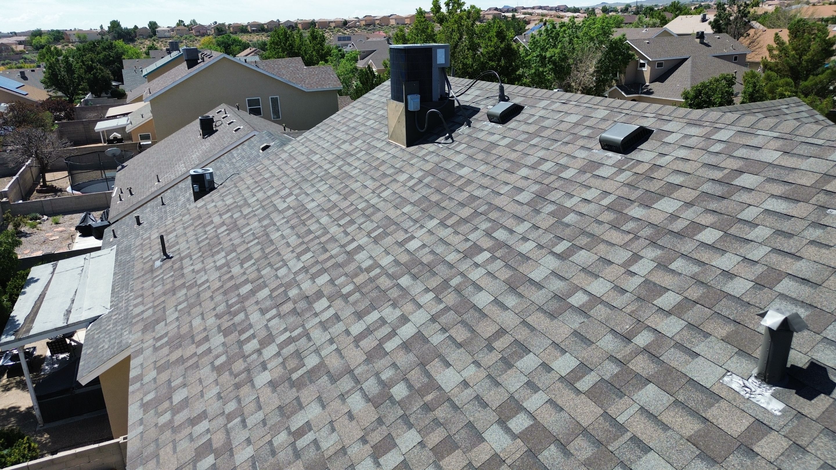 Calle Cordoba NW • Albuquerque, NM 87114 by Doyle Roof Masters Inc