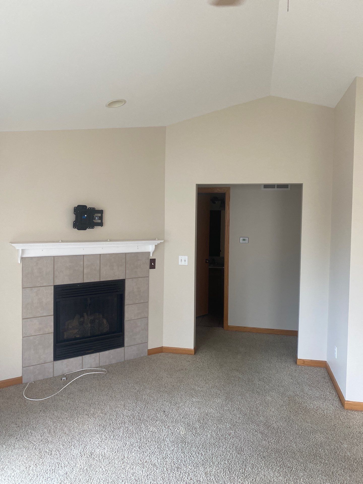 Living Room Wallpaper Removal and Interior Painting by OCS Contracting Services
