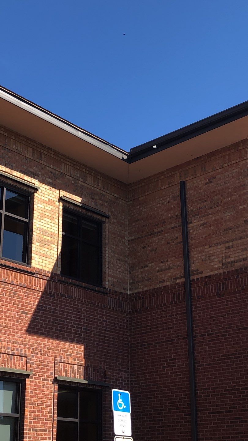 Pensacola Realtor Association Gutter Installation using K-Style White Gutters by Gutter Professors