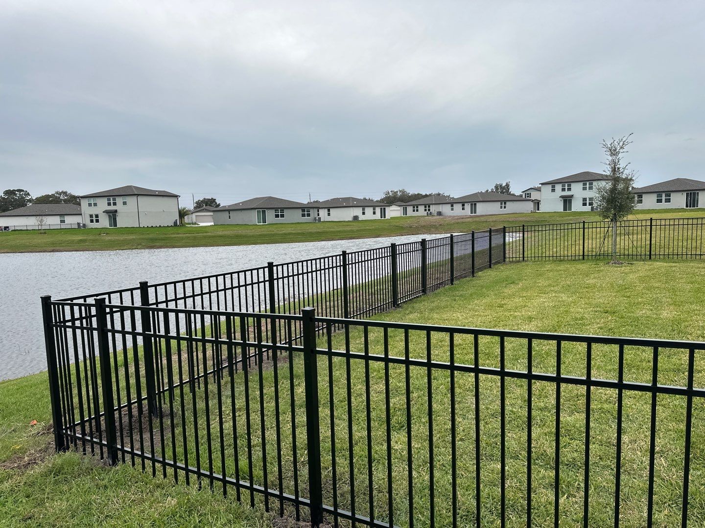 Aluminum Fence Installation using Black 3 Rail Aluminum Fence by Asap fence and gates, LLC