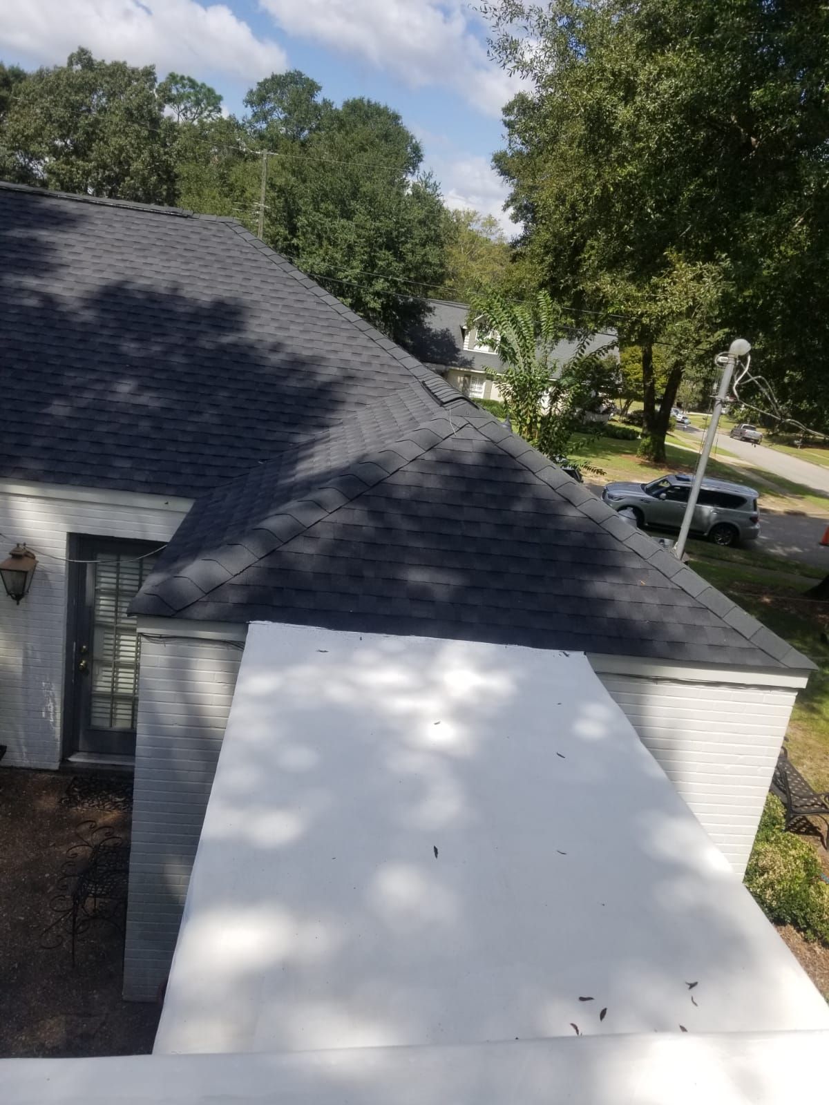 Residential Roofing Installation using Roof Replacement by American Roofing & Construction LLC